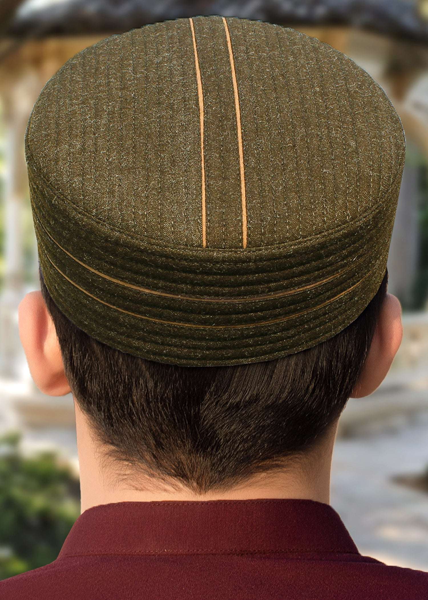 Ember two-tone kufi prayer cap for men, shown from the front