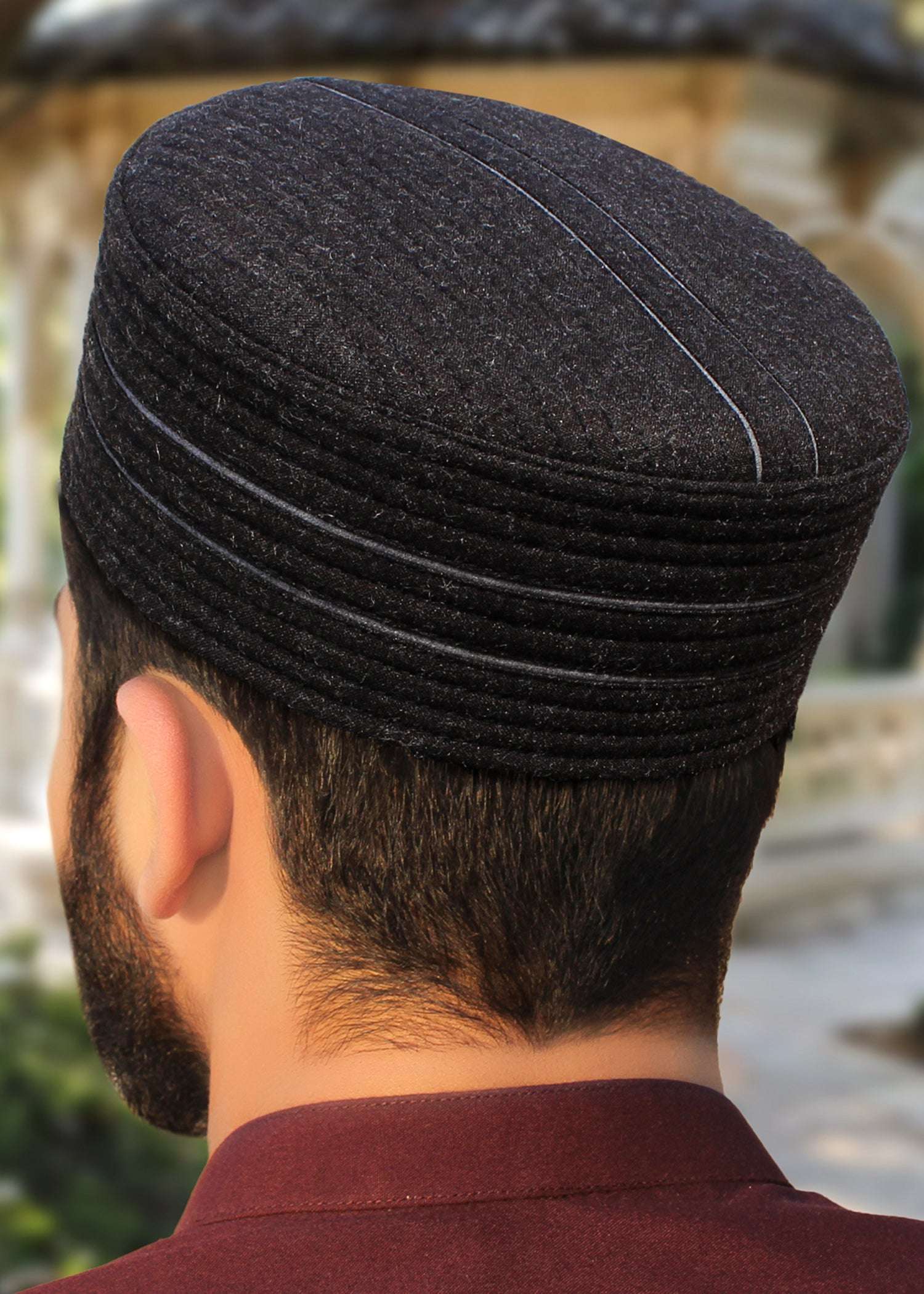 Ember two-tone kufi prayer cap for men, shown from the side