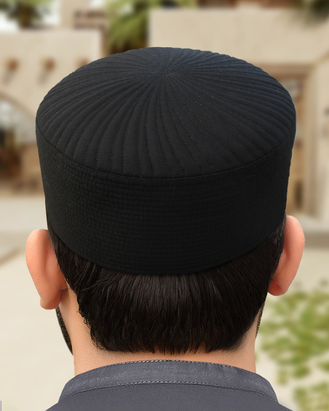 Black Fajr Kufi cap for men, showing the breathable fabric and lasting fit.