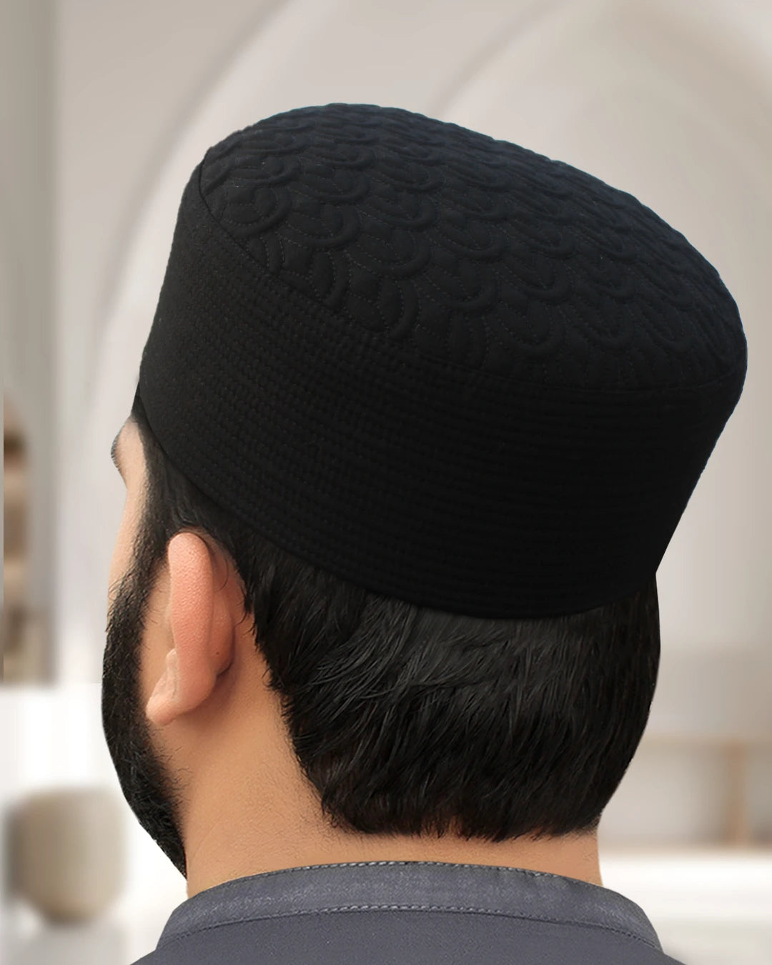 Black Qamar Kufi showing intricate quilted embroidery and lasting fit quality.