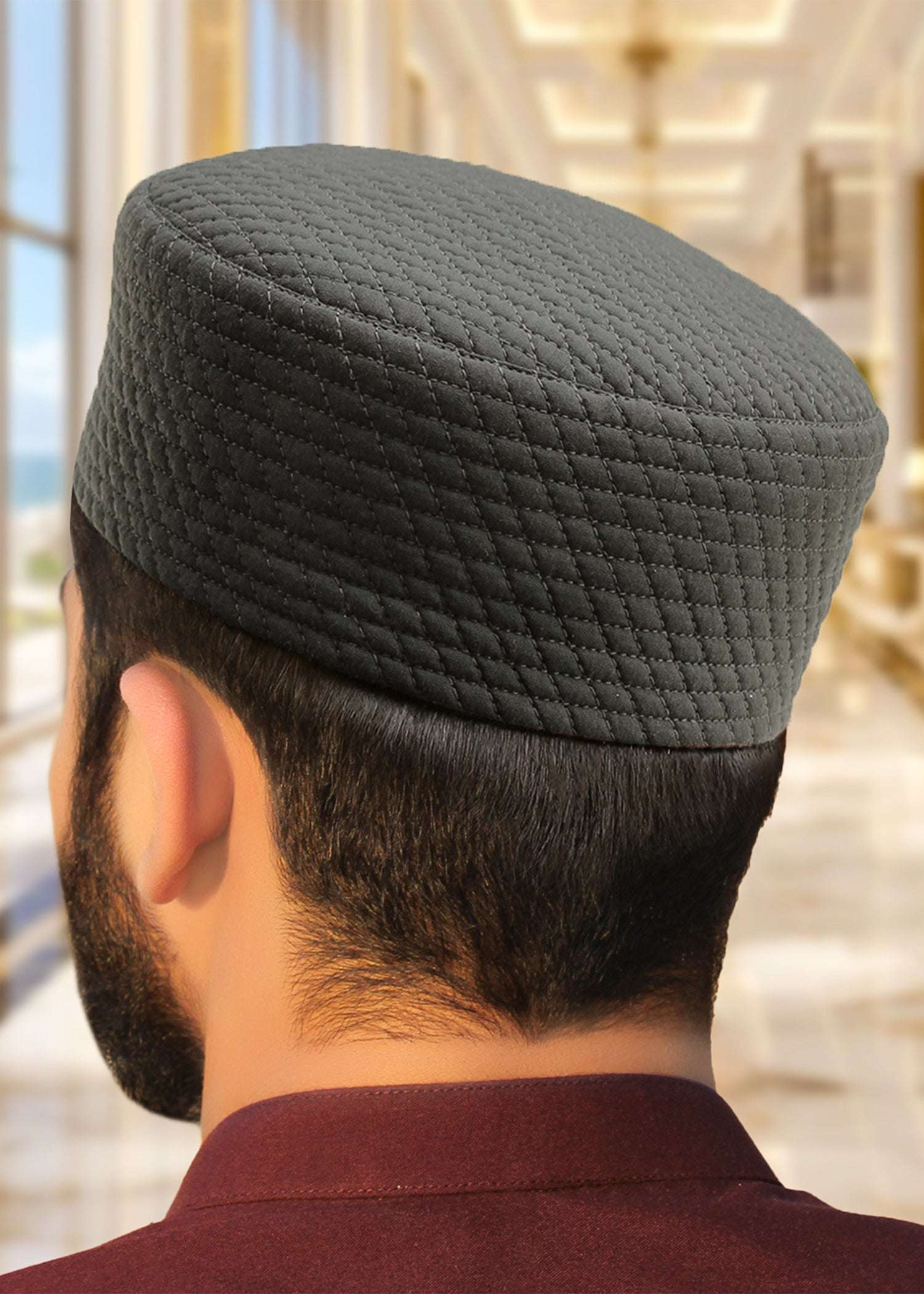 Dark gray quilted moorish kufi prayer cap for men, an everyday Sunnah essential