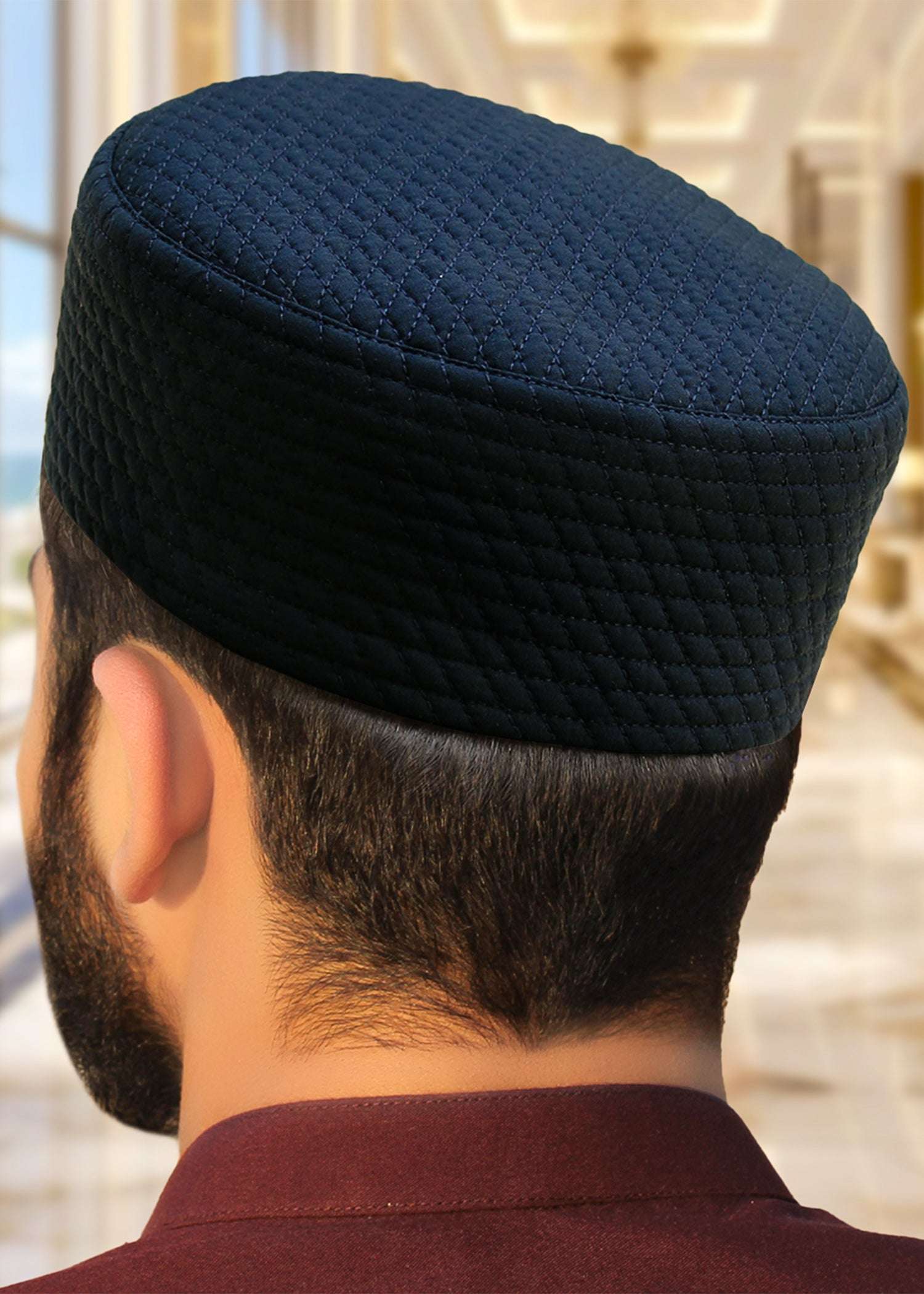 Navy blue quilted moorish kufi prayer cap for men, shown from the front
