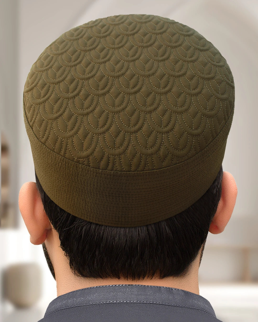 Close-up of the Smoky Ash Topi, highlighting the detailed embroidery and high resistance to shrinkage.