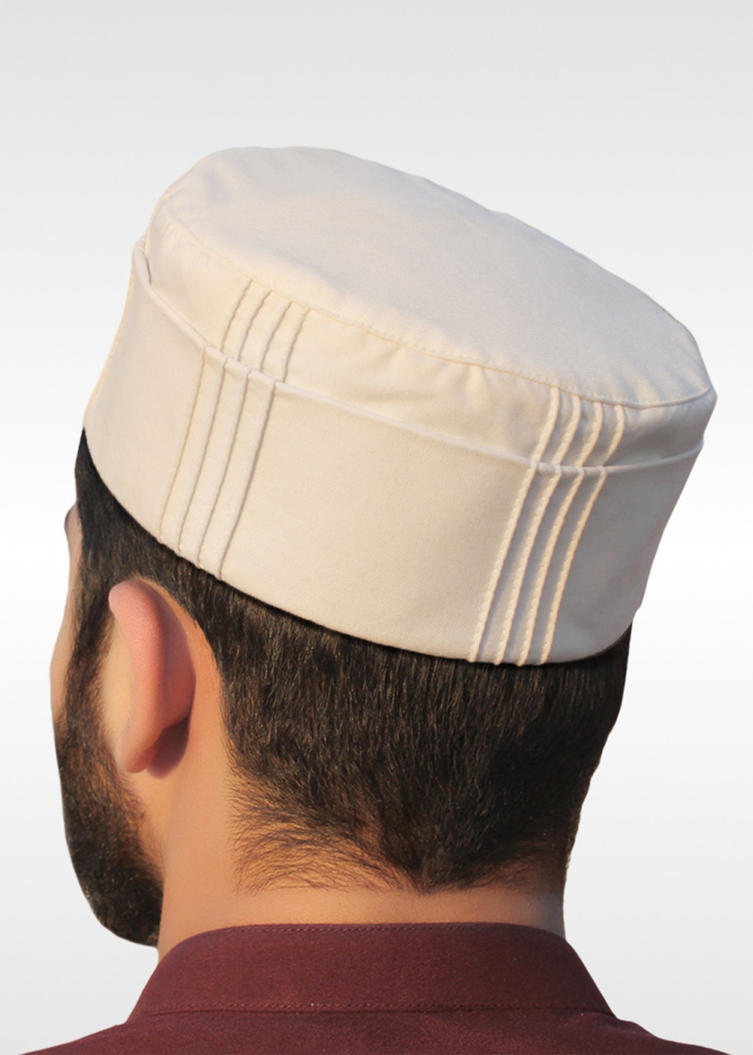 Traditional Taqiyah cap for men, showing the secure and lasting fit of the Islamic headwear.