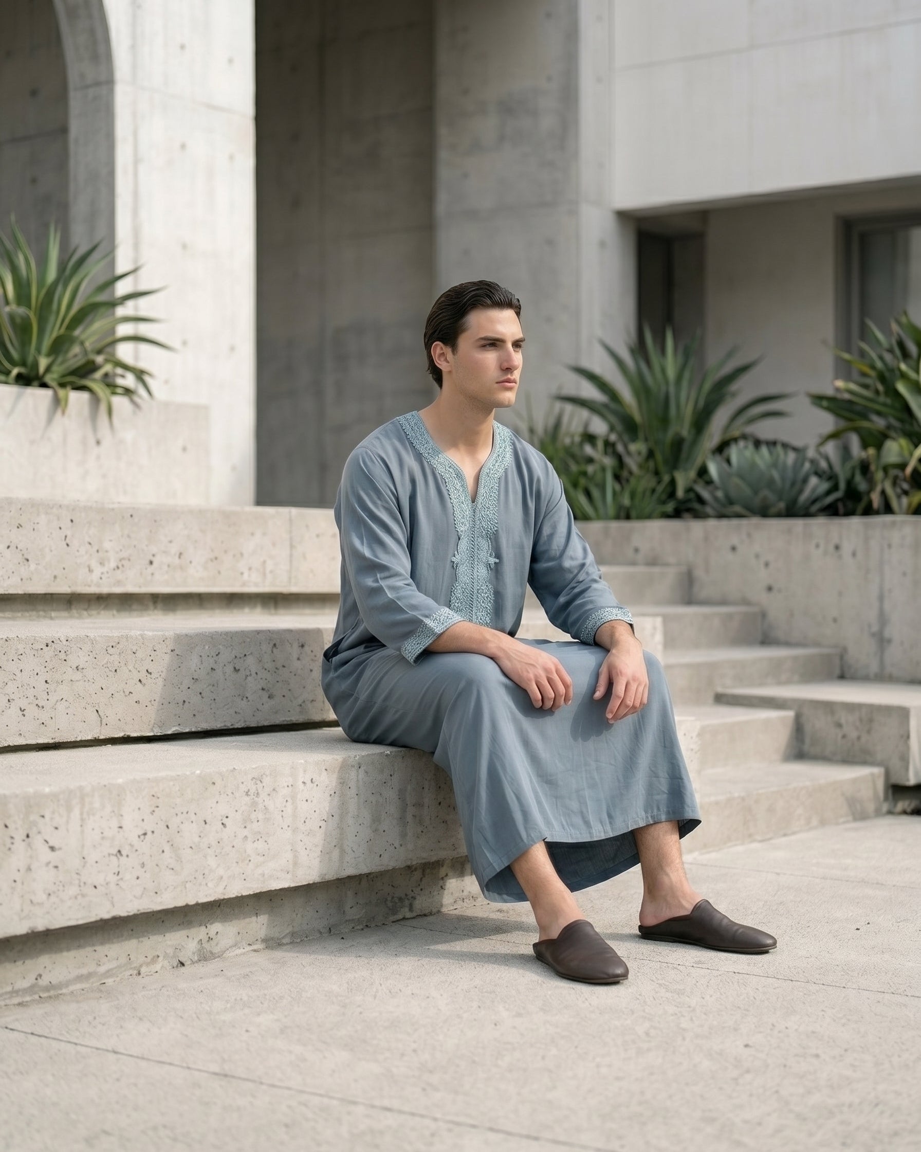 Authentic Moroccan style men's gandora in steel blue, luxury Islamic menswear, modest apparel for Muslims, traditional Middle Eastern clothing, premium three quarter sleeve thobe, best Eid clothing for men, modern modest wardrobe essentials.