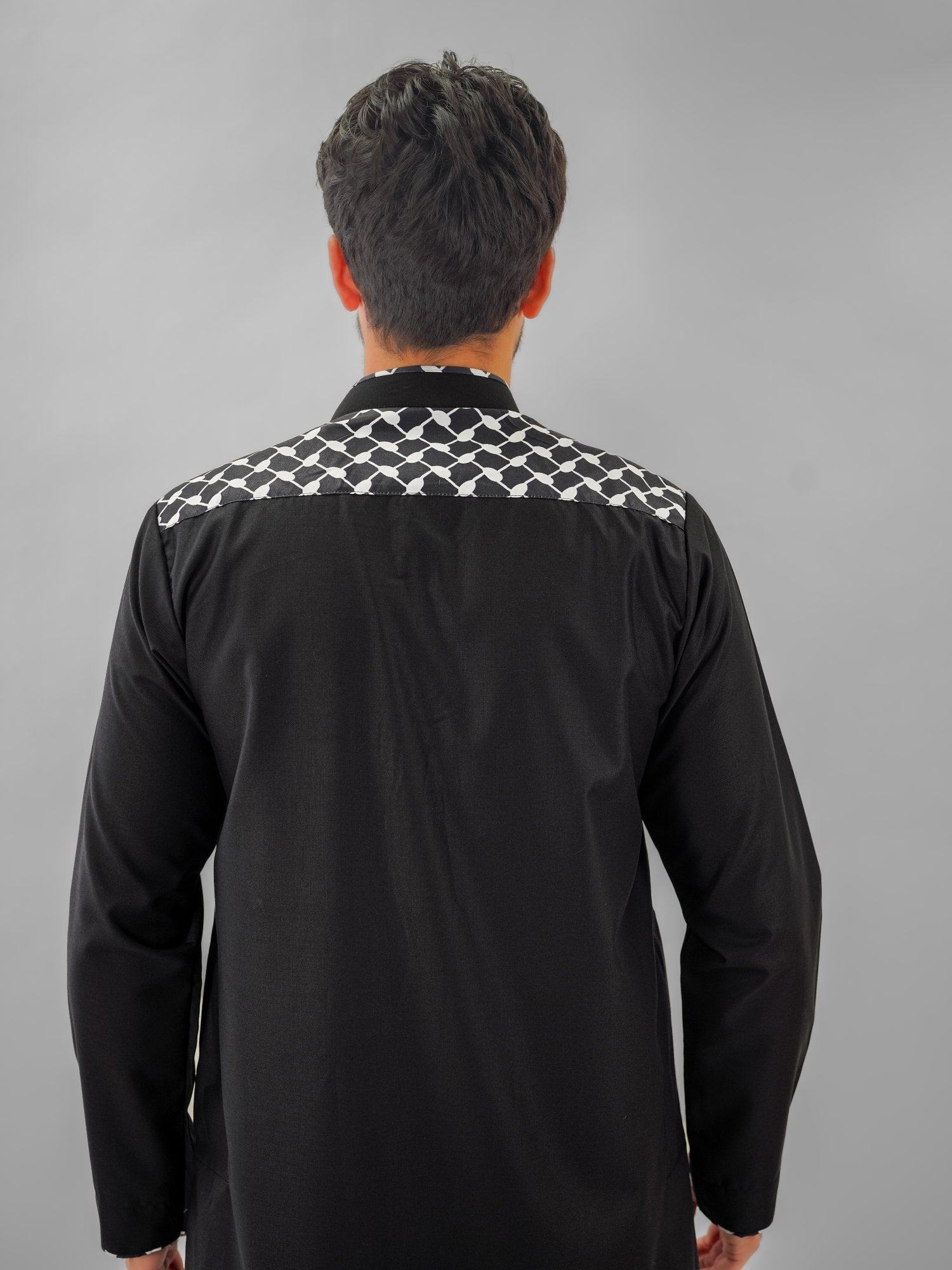 Black embroidered mandarin collar thobe for men, side profile view