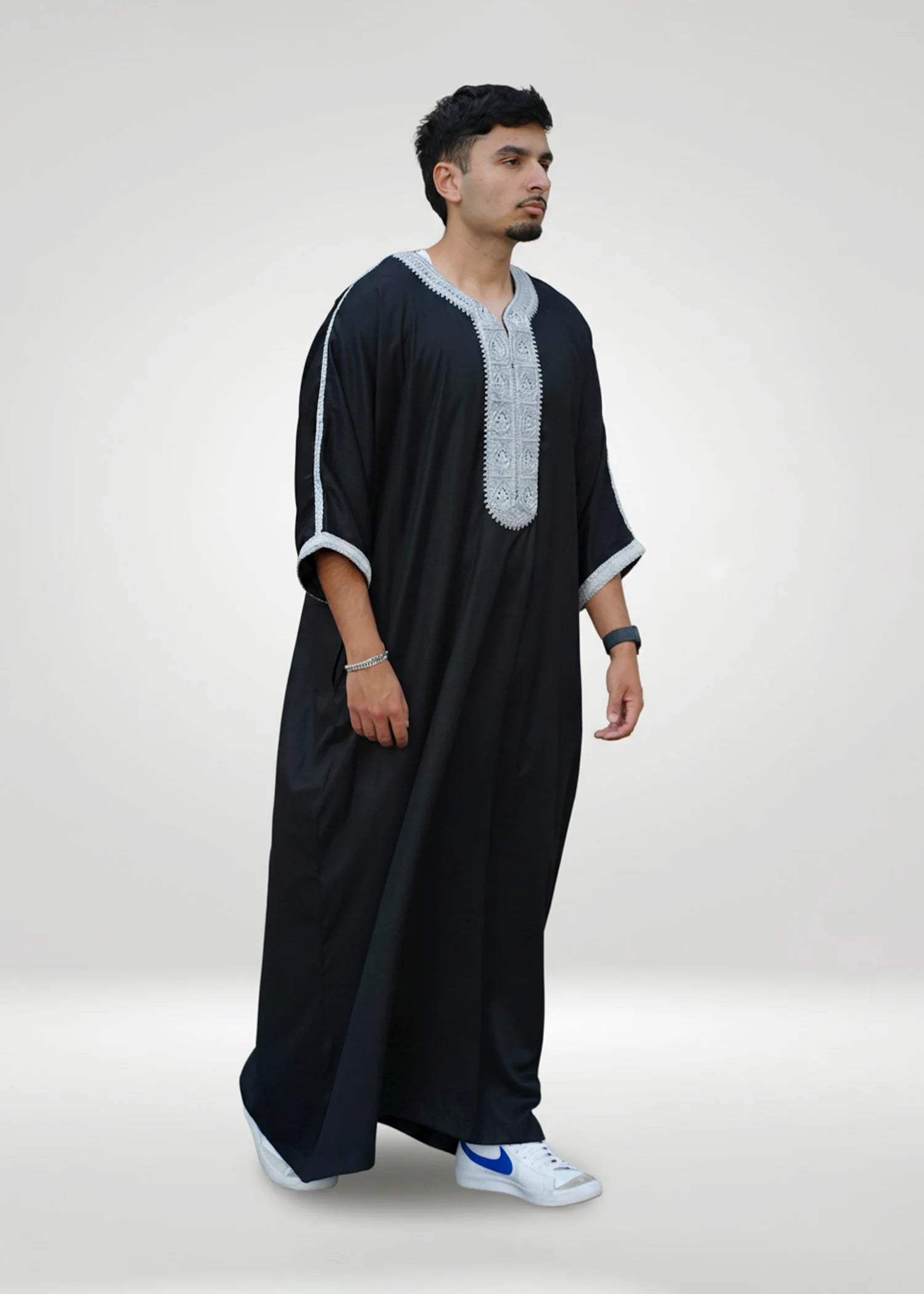 Full body back view of the Black & Gold Thobe, emphasizing the beautiful drape of the Polyester-Viscose fabric blend.