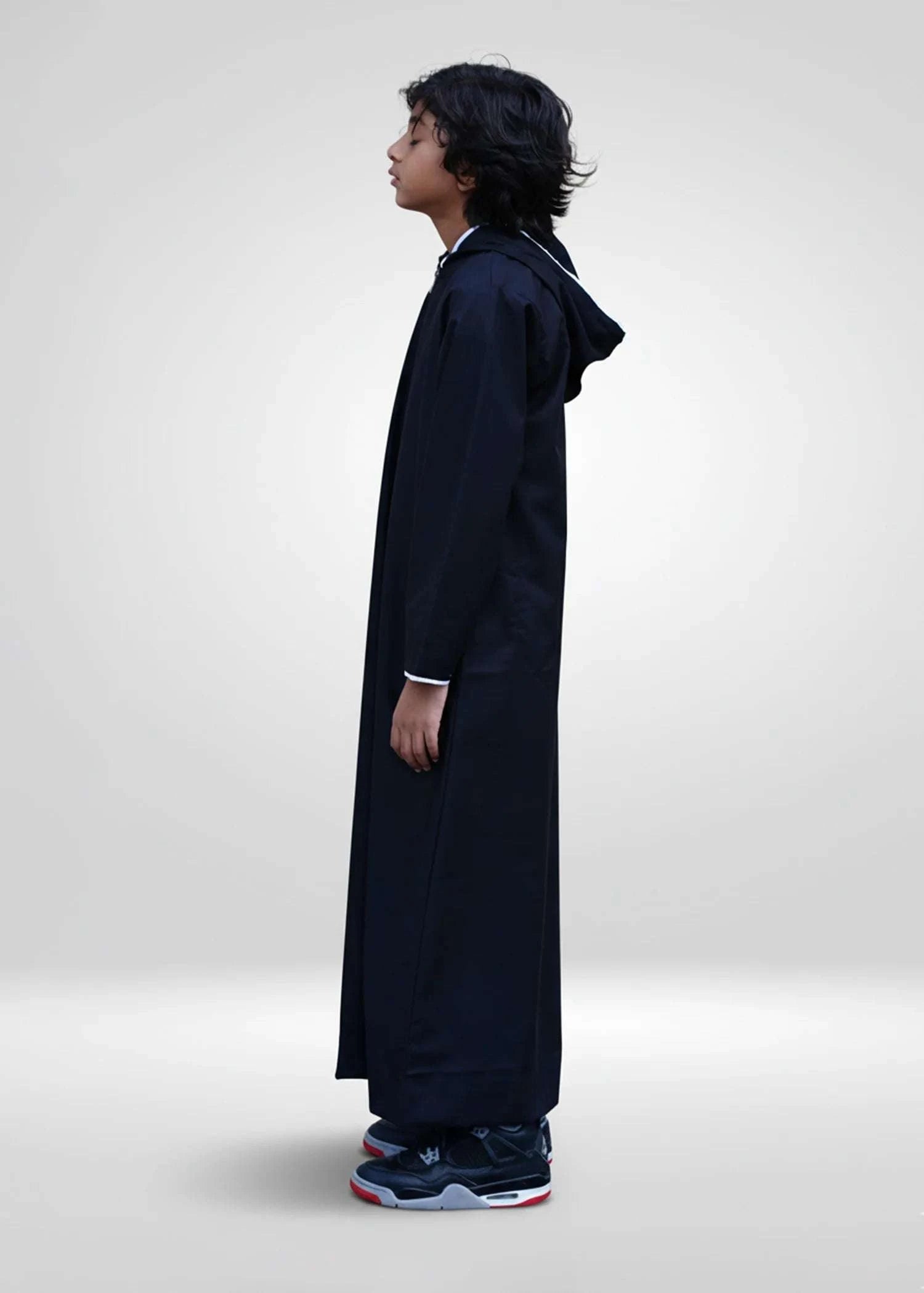 Black hoodie thobe with white piping trim for boys, hood and drawstring in detail