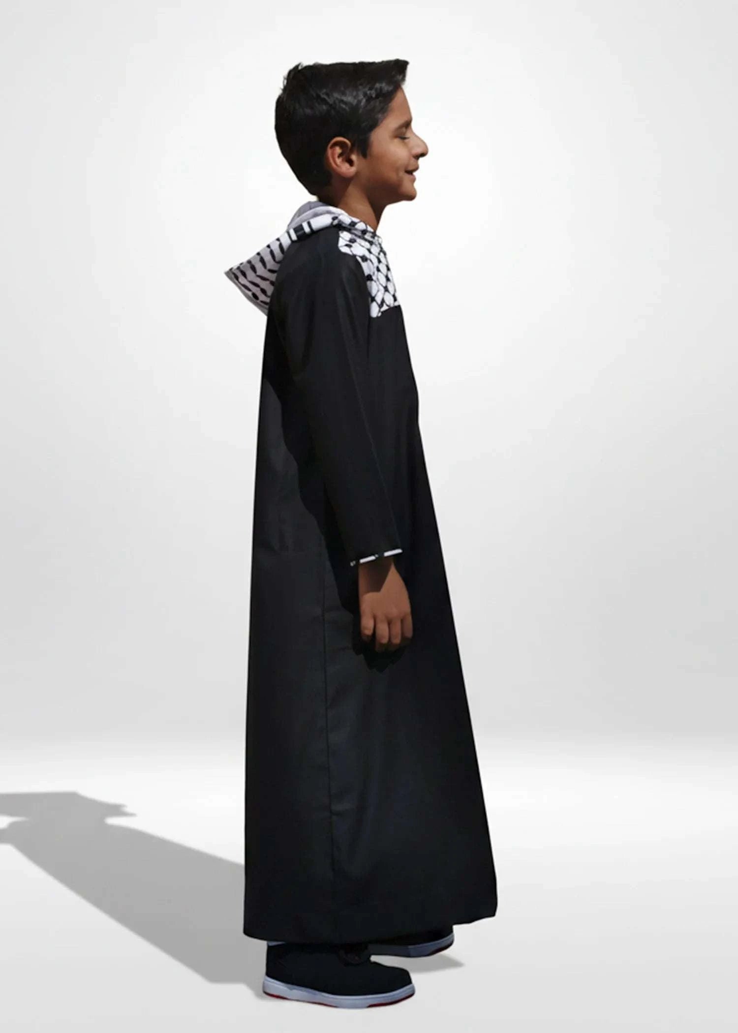 Black Kufiya hoodie thobe with Palestinian pattern for boys, back view
