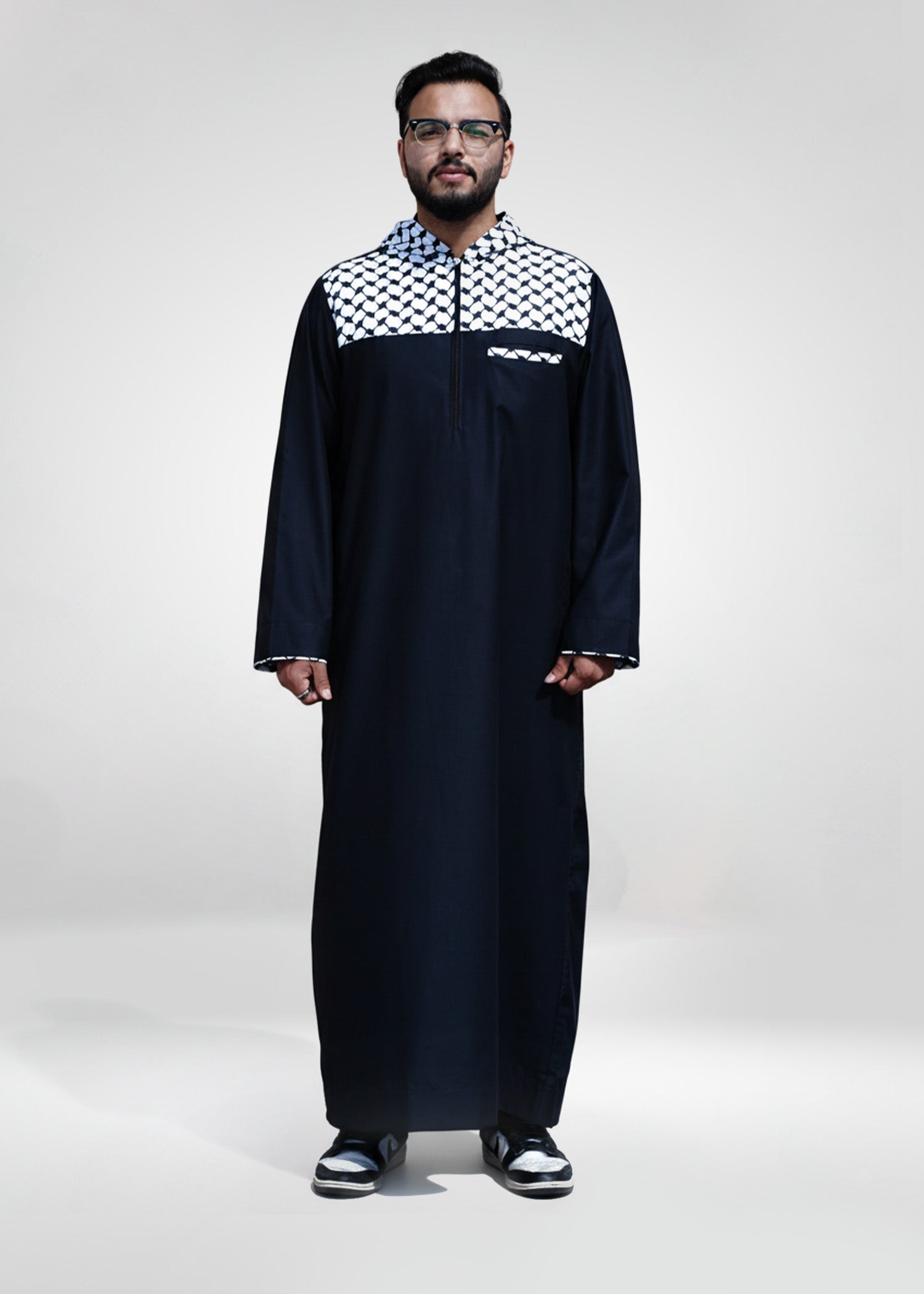 Front view of the Black Palestine Hoodie Thobe showing the kufiya pattern and modern streetwear style