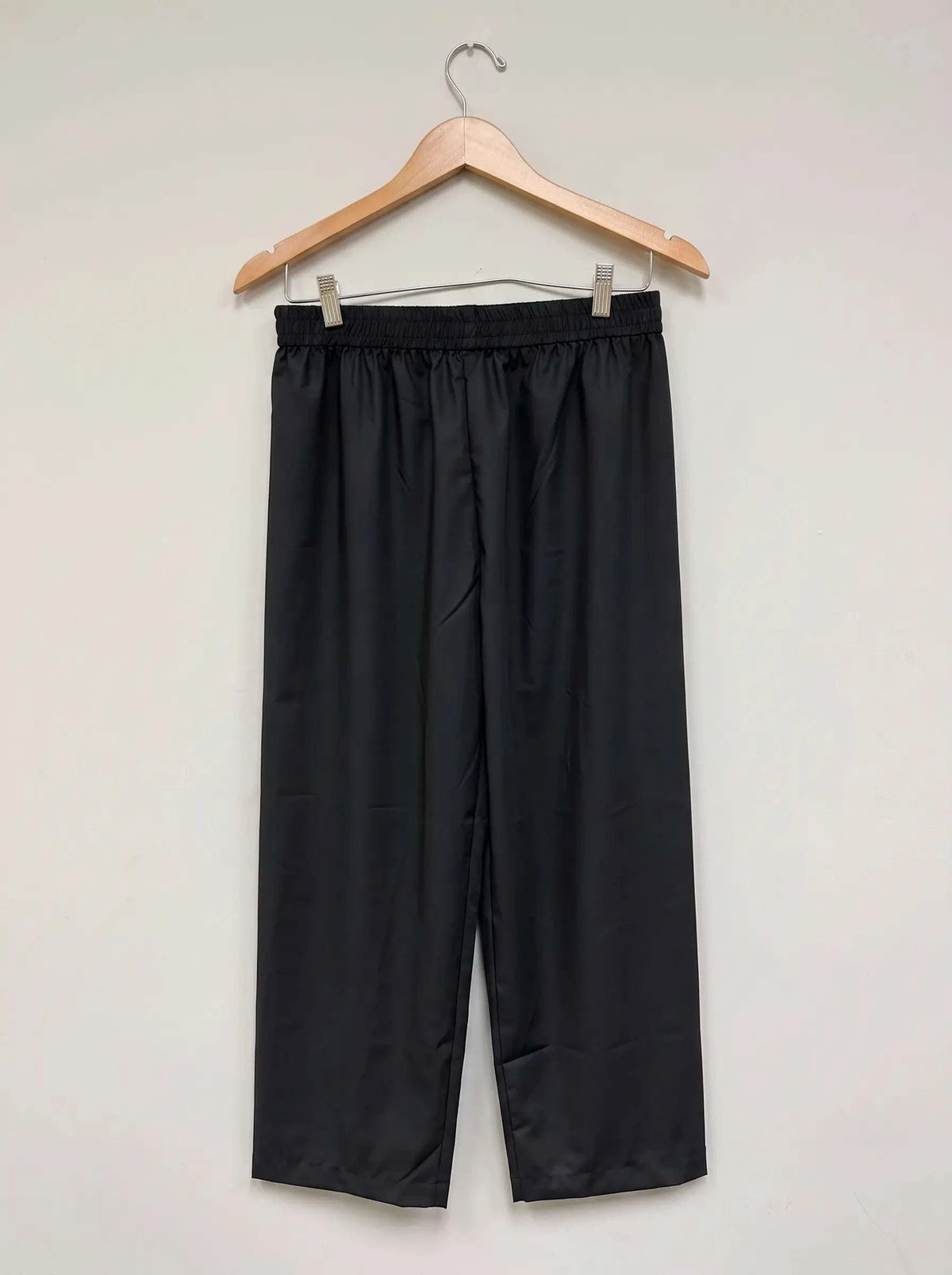 Black thobe trouser for men, shown from the front