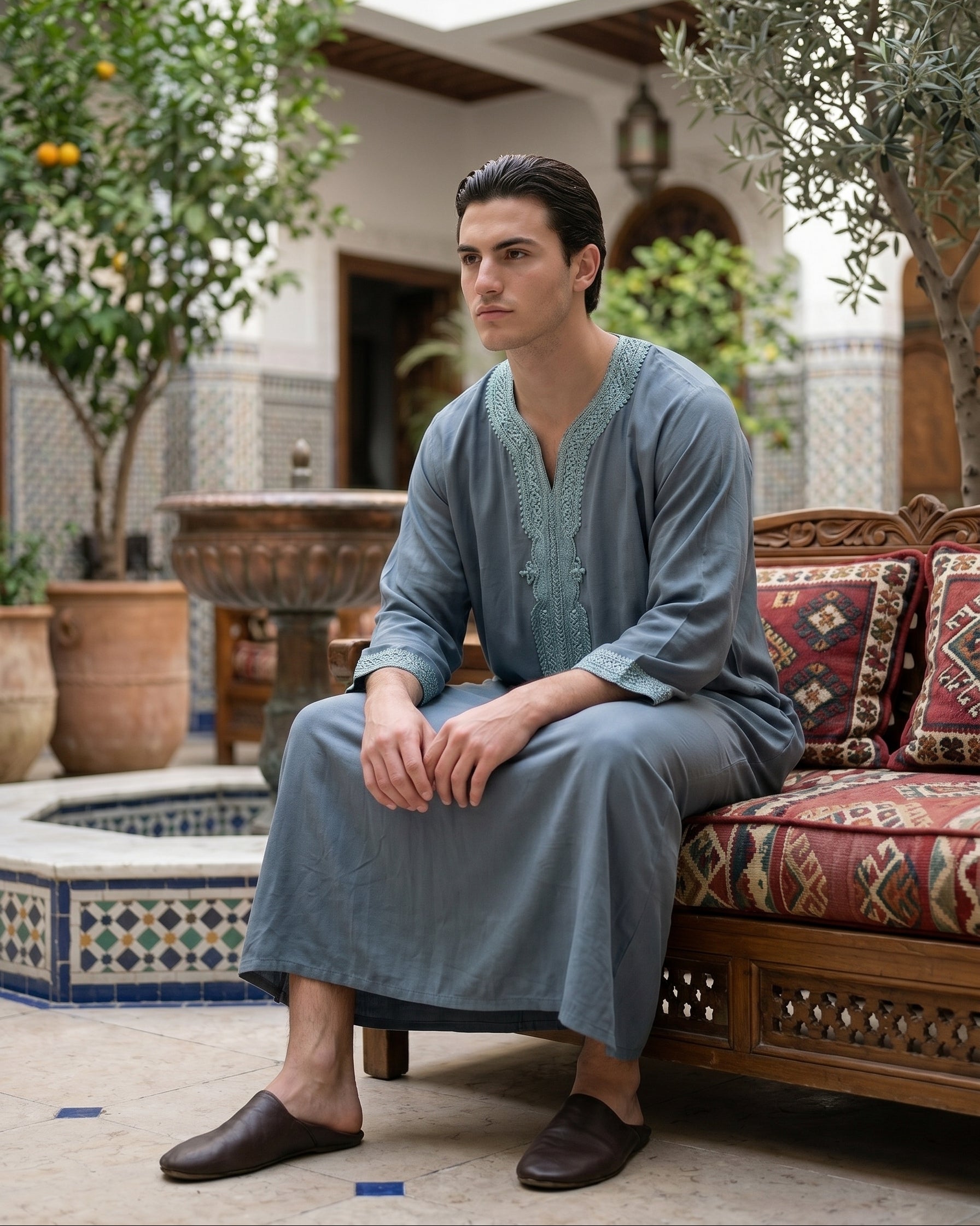 Elegant slate blue men's thobe with traditional embroidery, premium modest fashion, comfortable Friday prayer clothes, stylish Muslim men's apparel, high-quality Moroccan jubbah, designer Islamic garments, affordable Sunnah clothing.