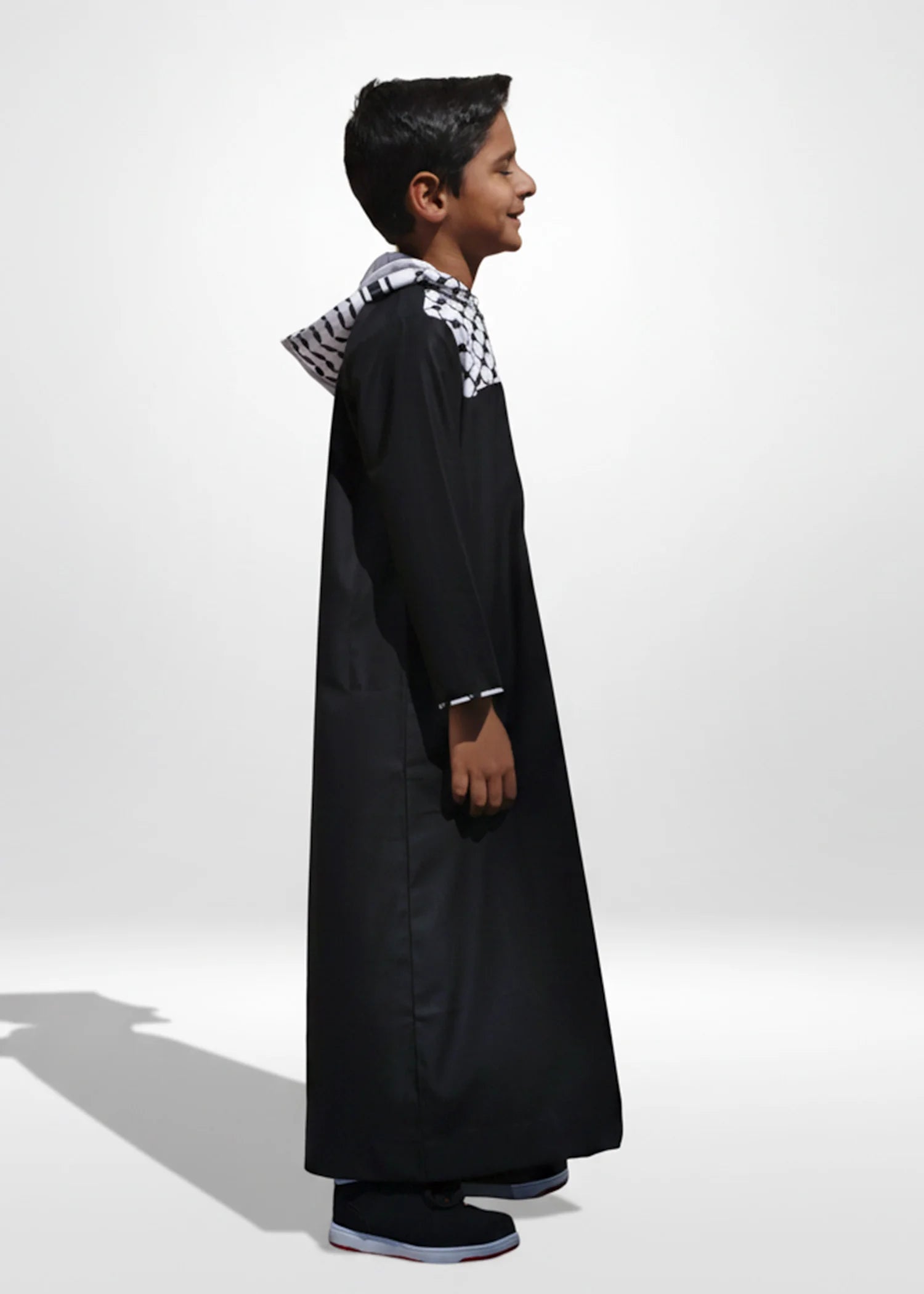 Back view of the Black Palestine Hoodie Kids Thobe showing the hood and clean silhouette