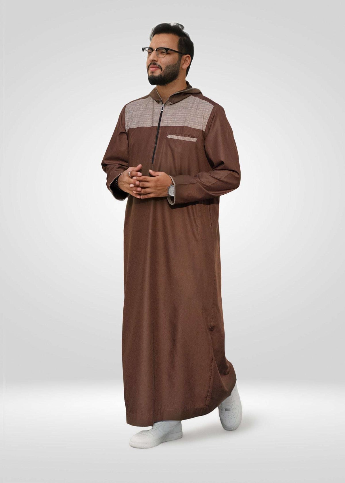 Brown hooded thobe with checkered streetwear for men, close-up of the hood and zip