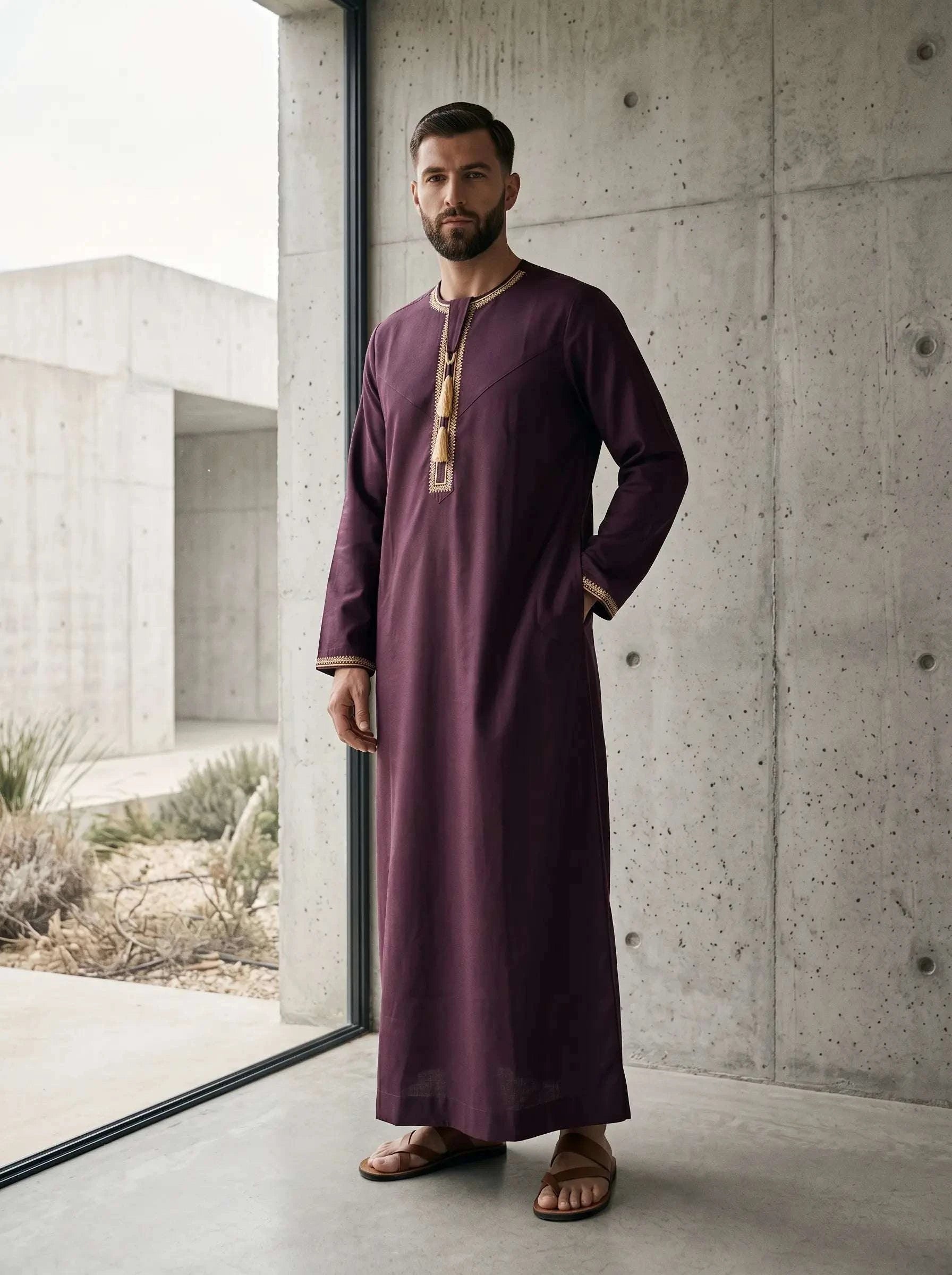 Burgundy Emirati thobe with a V-neck and tarboush for men, shown from the front