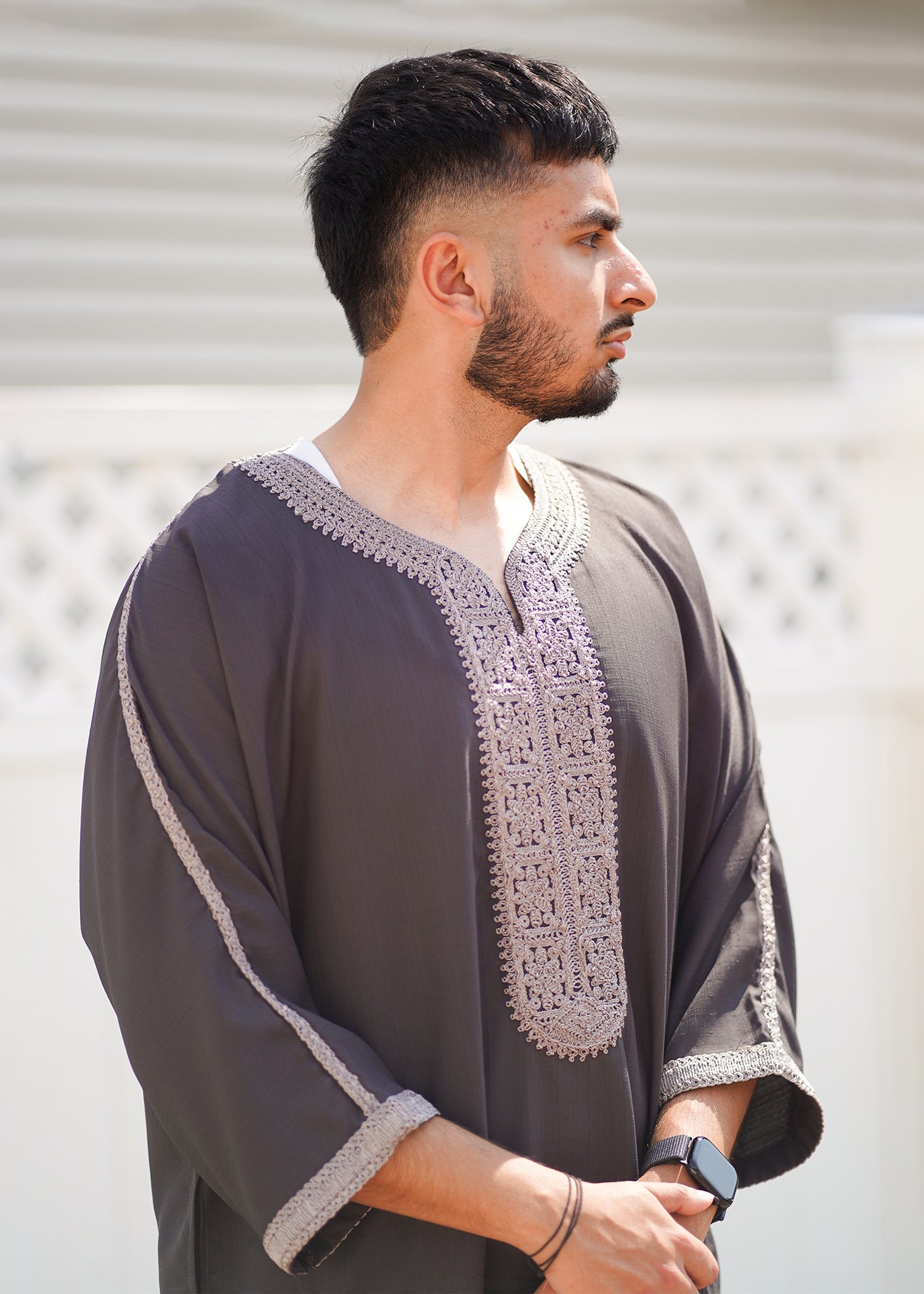 Full body back view of the Deep Charcoal Thobe, emphasizing the quality and elegant drape of the fabric.