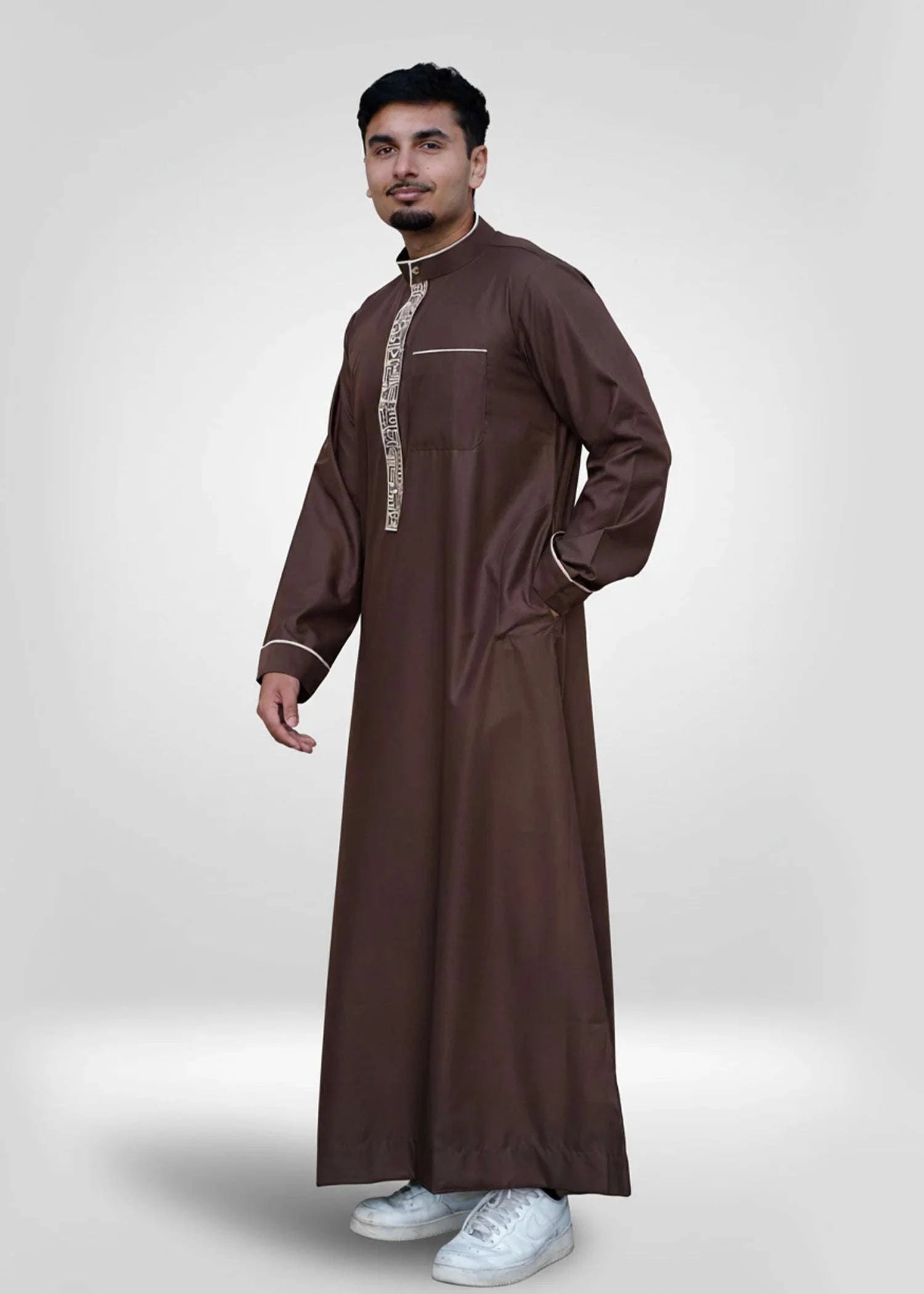 Chocolate brown embroidered thobe with beige mandarin collar for men, side profile view