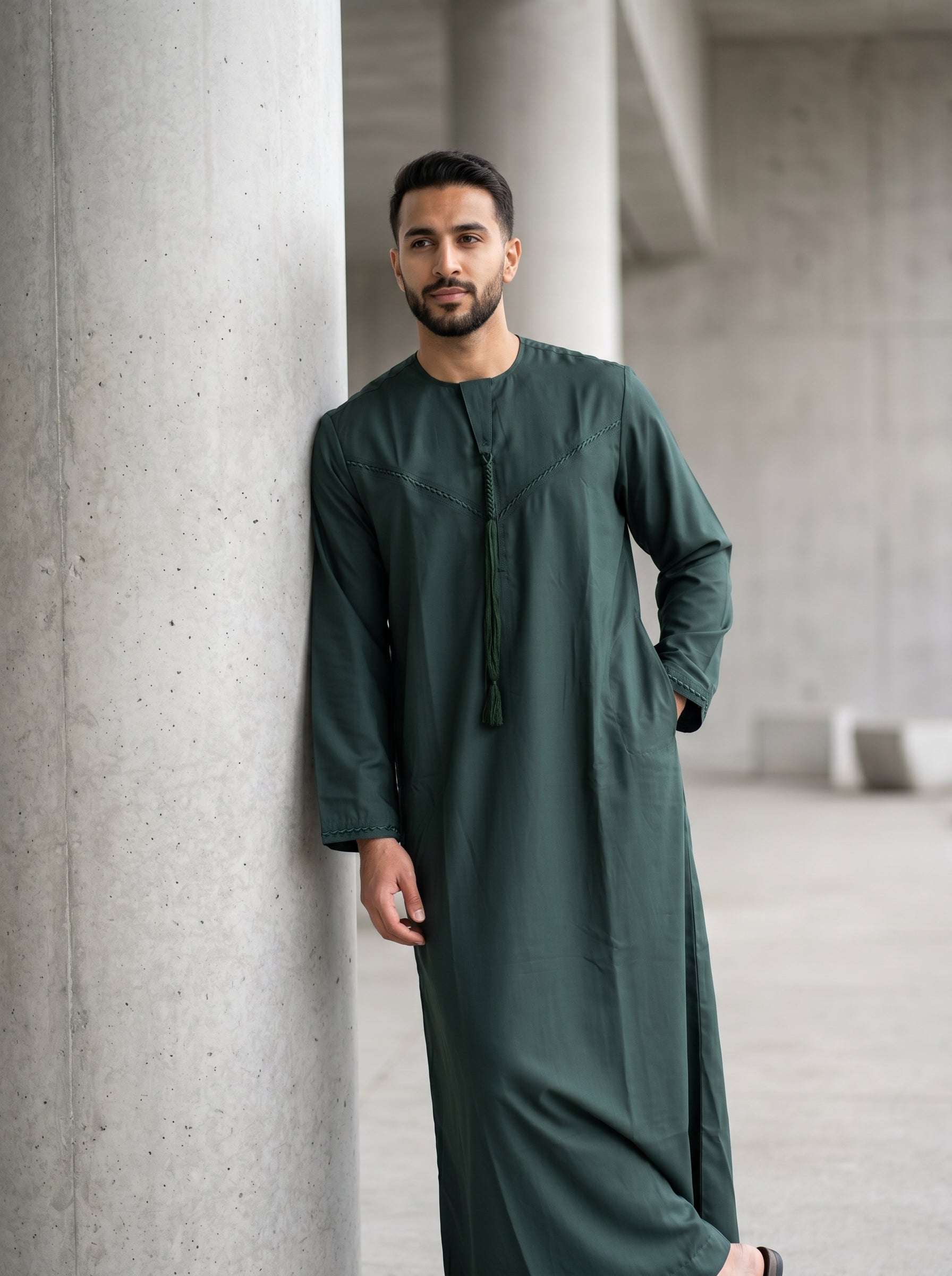 Dark green Emirati jubba for men, close-up of the fabric
