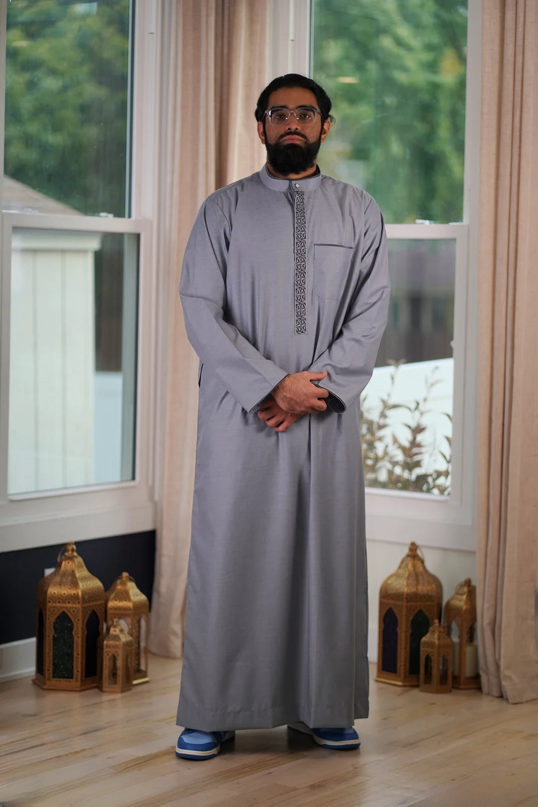 Close-up of the long sleeve cuff detail, reinforcing exclusive design and high-quality construction.