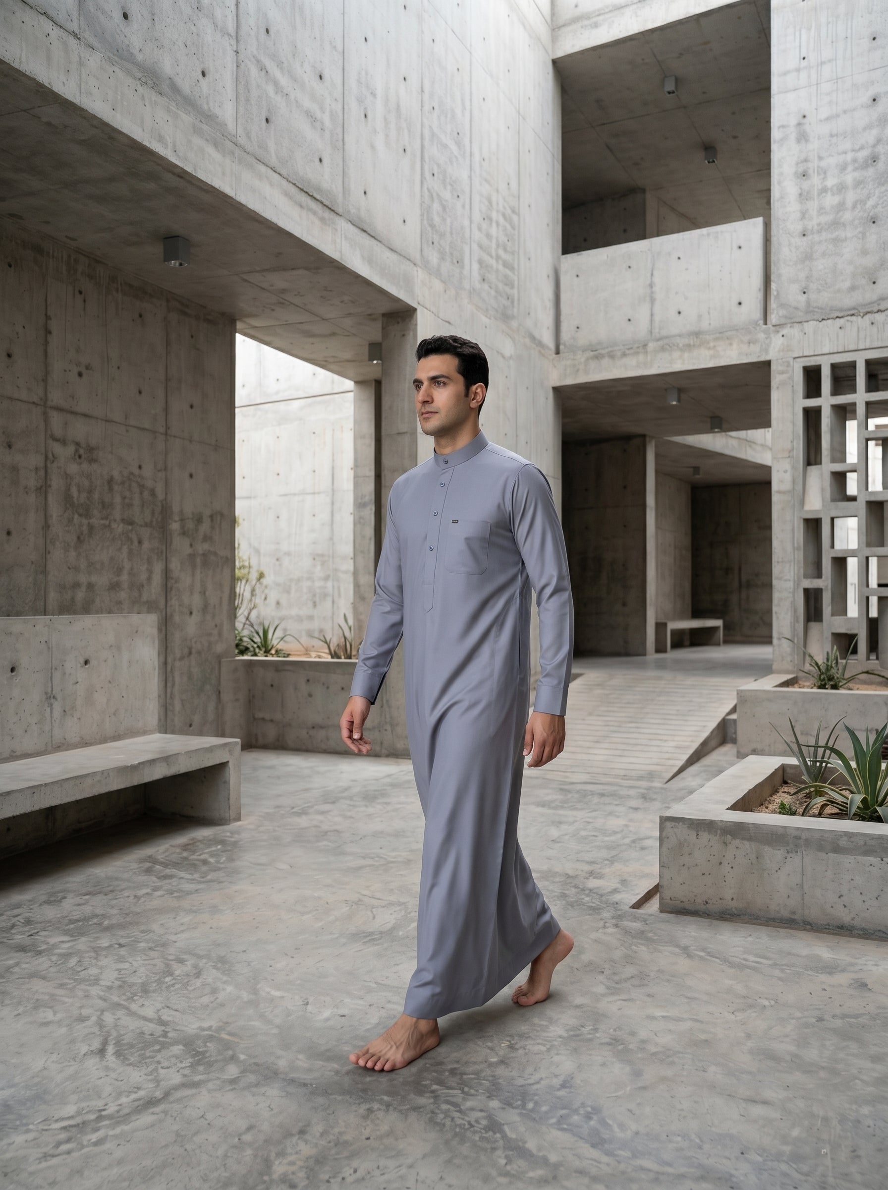 Buy the ultimate men's grey thobe online. This premium grey jubba is a must-have for your modern Islamic clothing collection in the USA. The Topi Wala specializes in luxury modest fashion, Sunnah wear, and high-quality Muslim men's apparel. Get ready for Eid ul Adha with our exclusive tailored thobes, featuring exceptional fabric and stitching. Serving the Chicago Muslim community in Glendale Heights with stylish jubbahs. Order your premium Islamic menswear today with free nationwide US shipping.