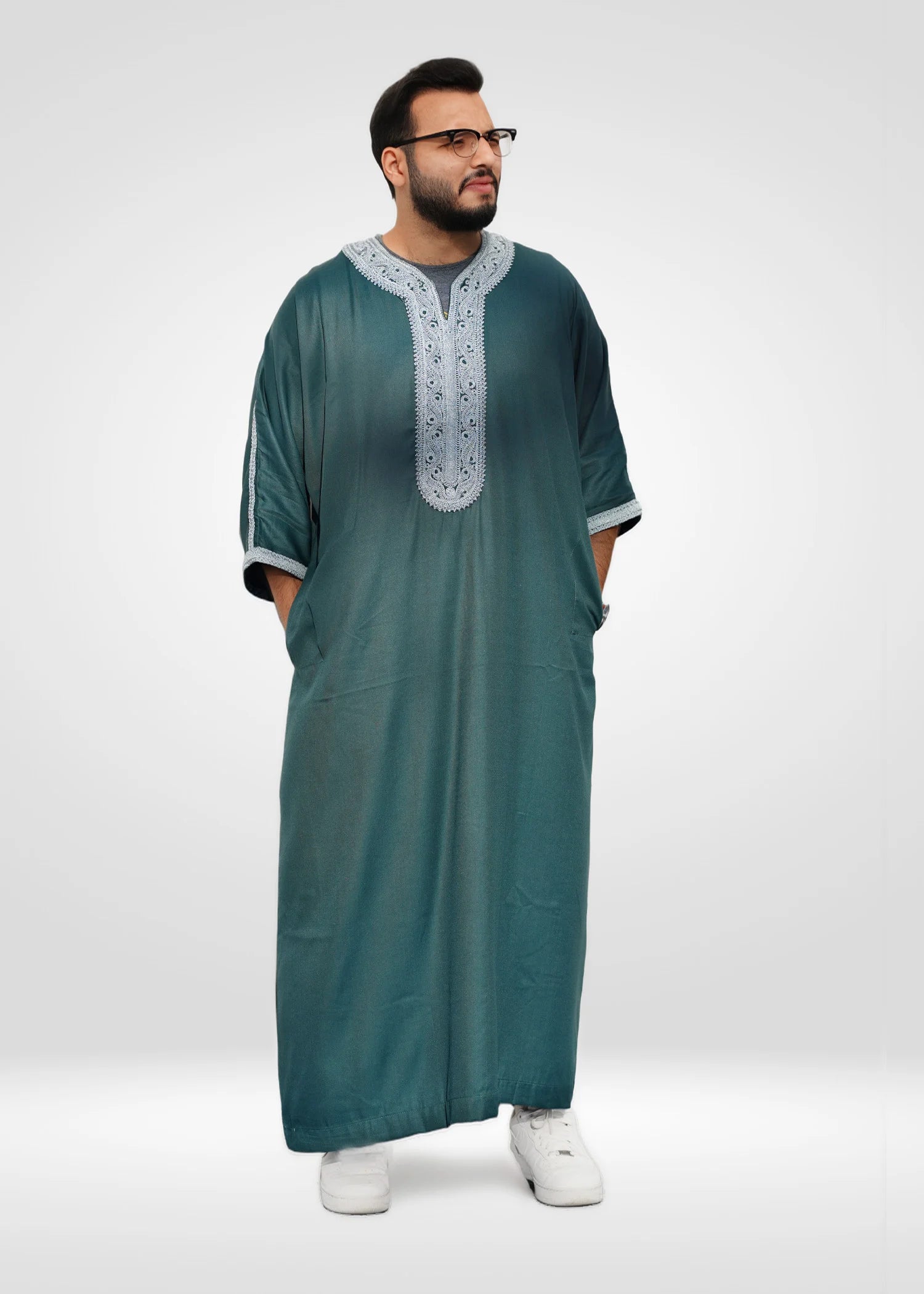 Extreme close-up of the smooth, breathable fabric texture of the high-quality Islamic formal wear.