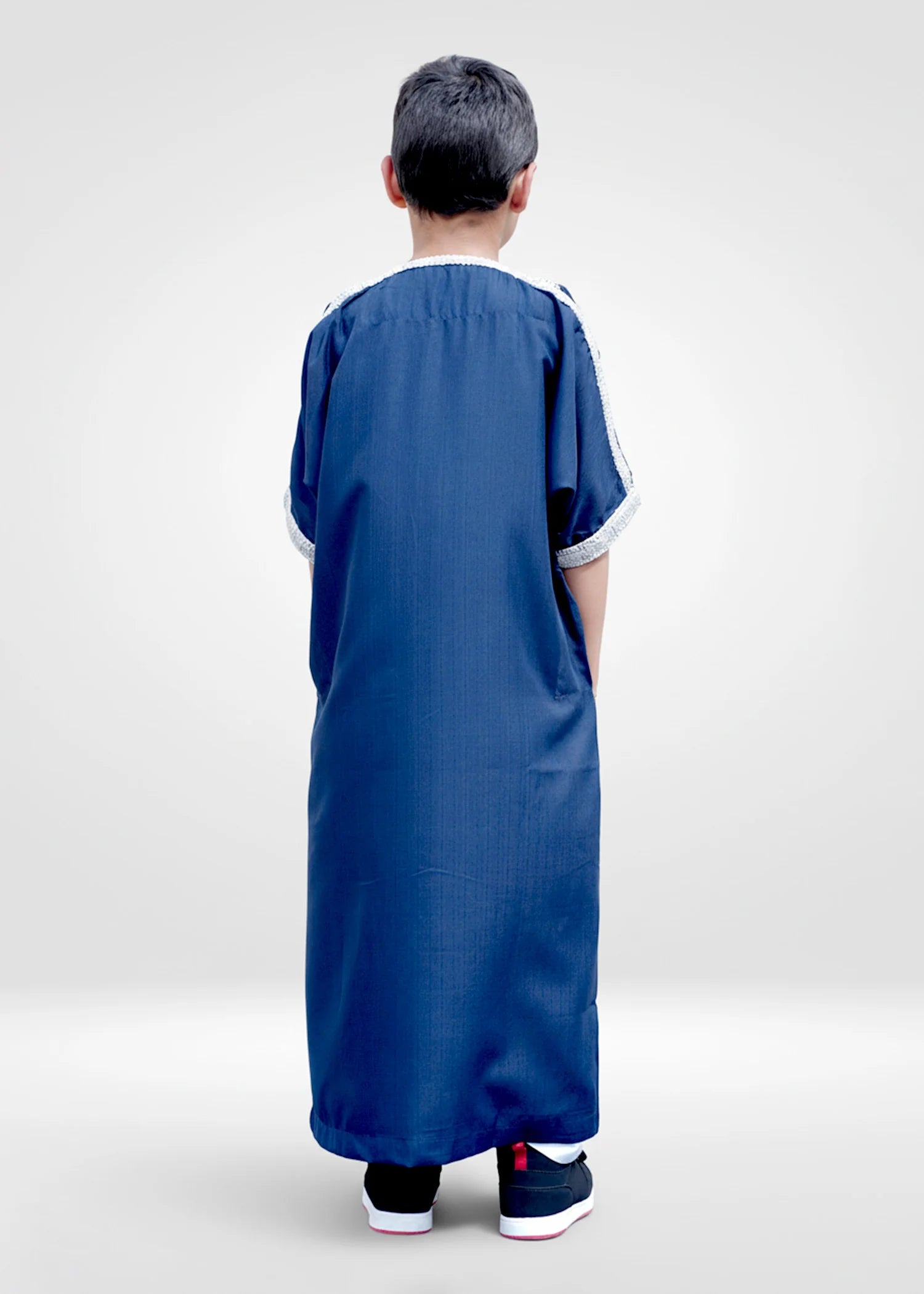 Back view of the Blue/Silver Moroccan Kids Thobe highlighting the deep color and simple silhouette