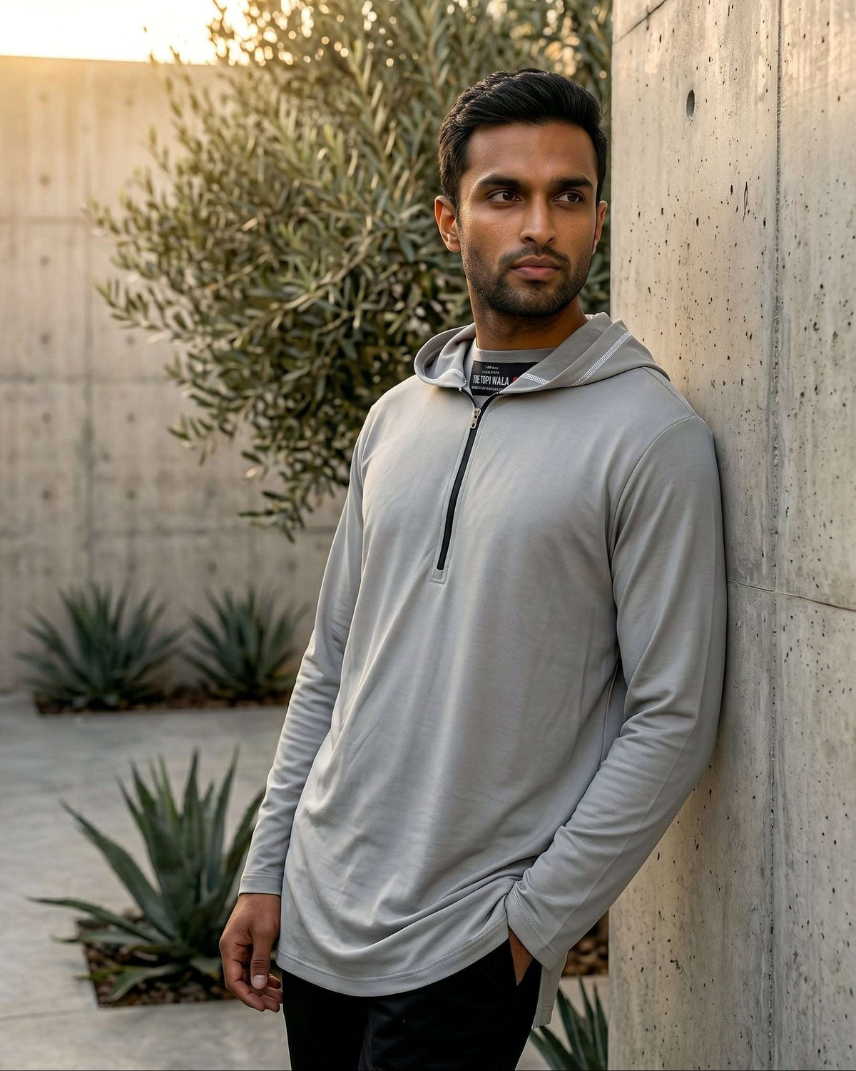 Light grey hooded kurta with half-zip jersey for men, side profile view