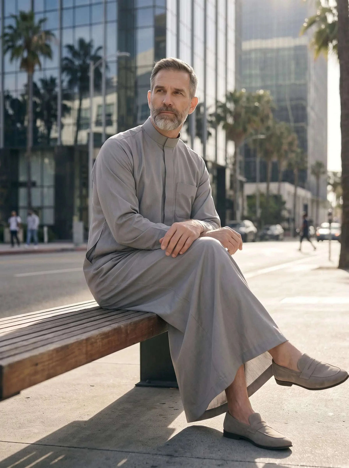 Light grey minimalist thobe with hidden placket for men, collar and button detail