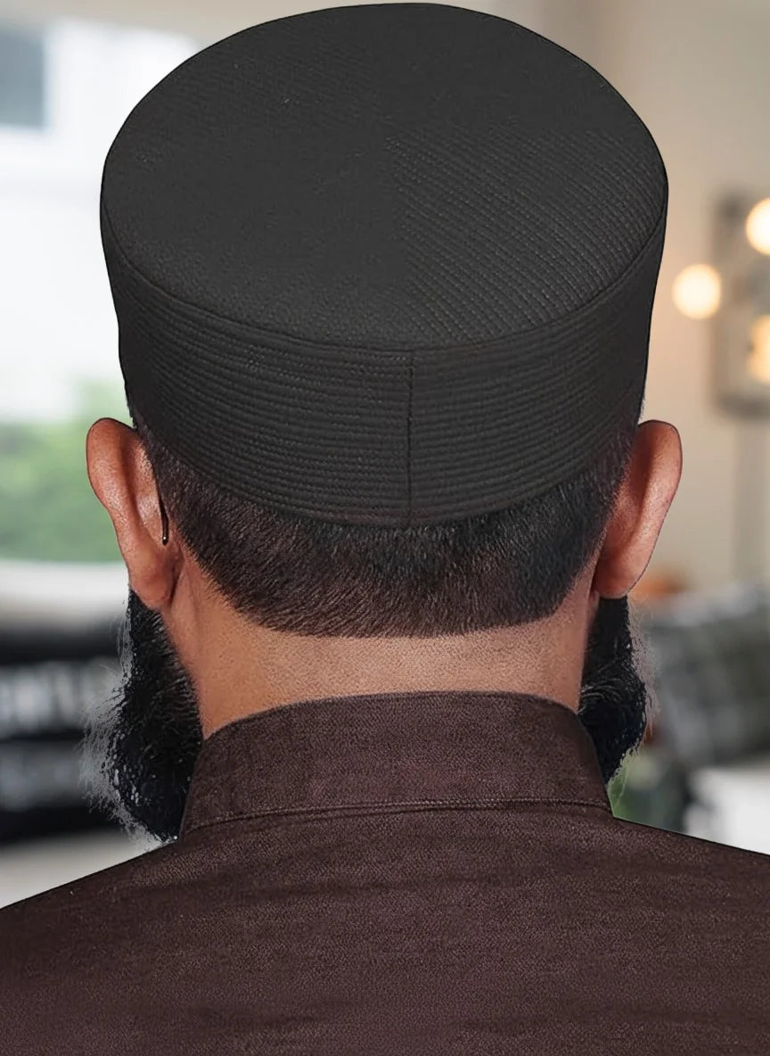 Side profile view of the Barakah Kufi showing the height and perfect fit on the head