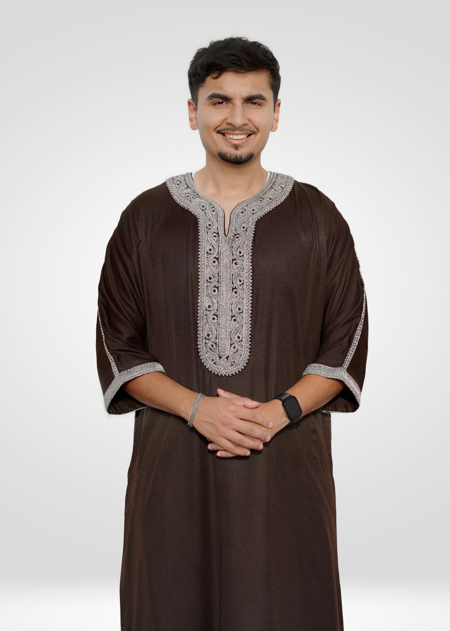 Side view of the espresso gandora showing the loose sleeves and comfortable drape