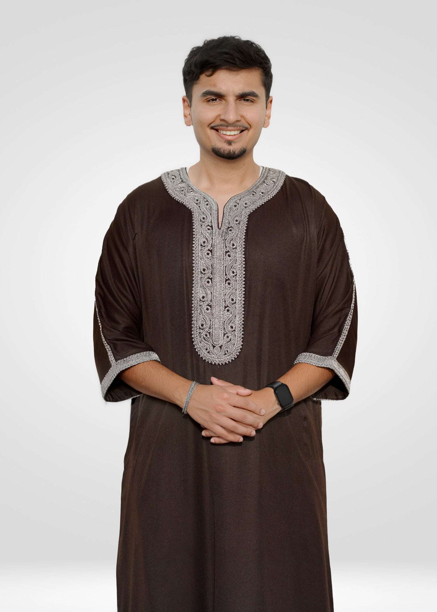 Side view of the espresso gandora showing the loose sleeves and comfortable drape