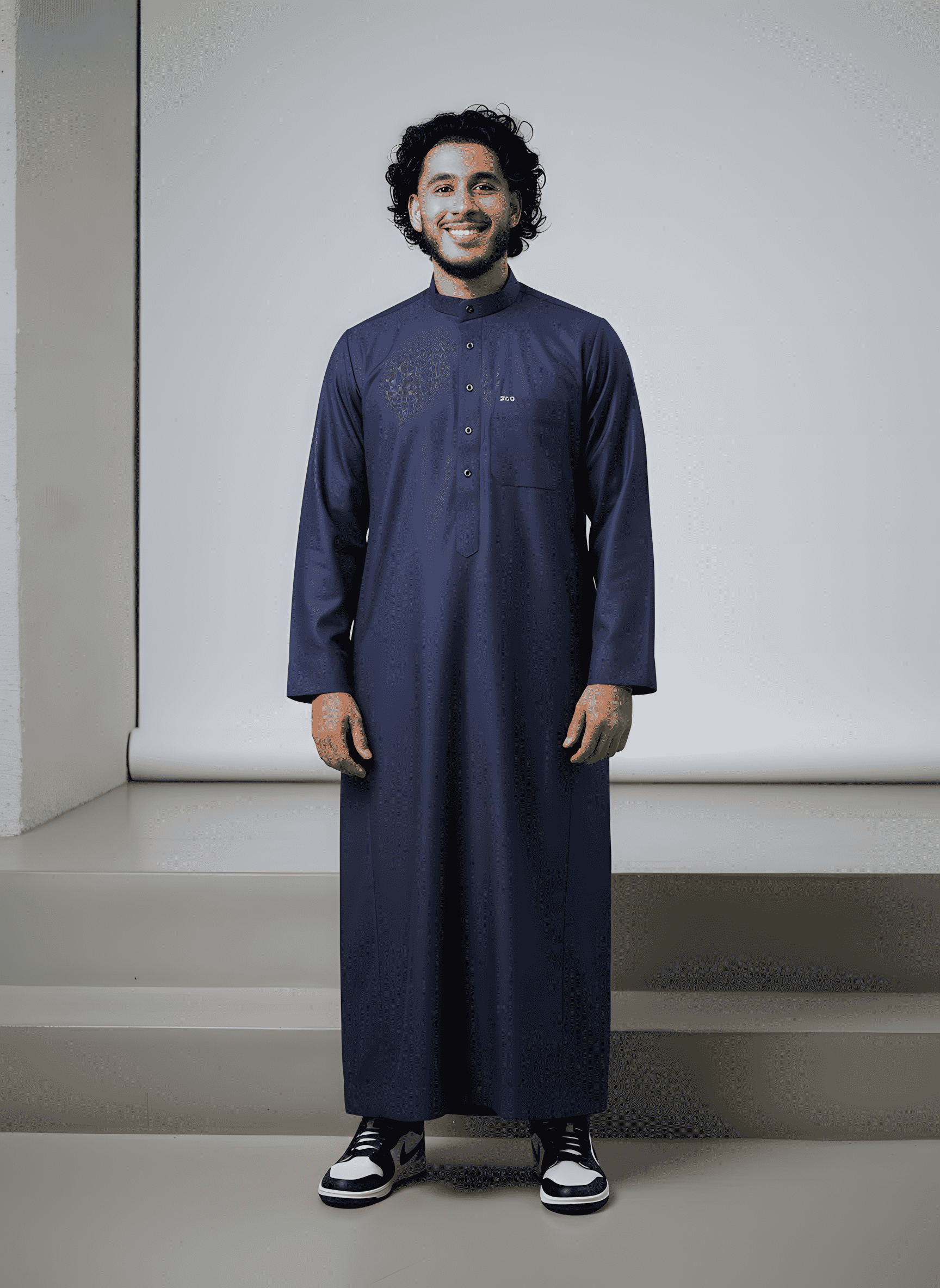 Men's navy blue thobe with mandarin collar, front styled view.