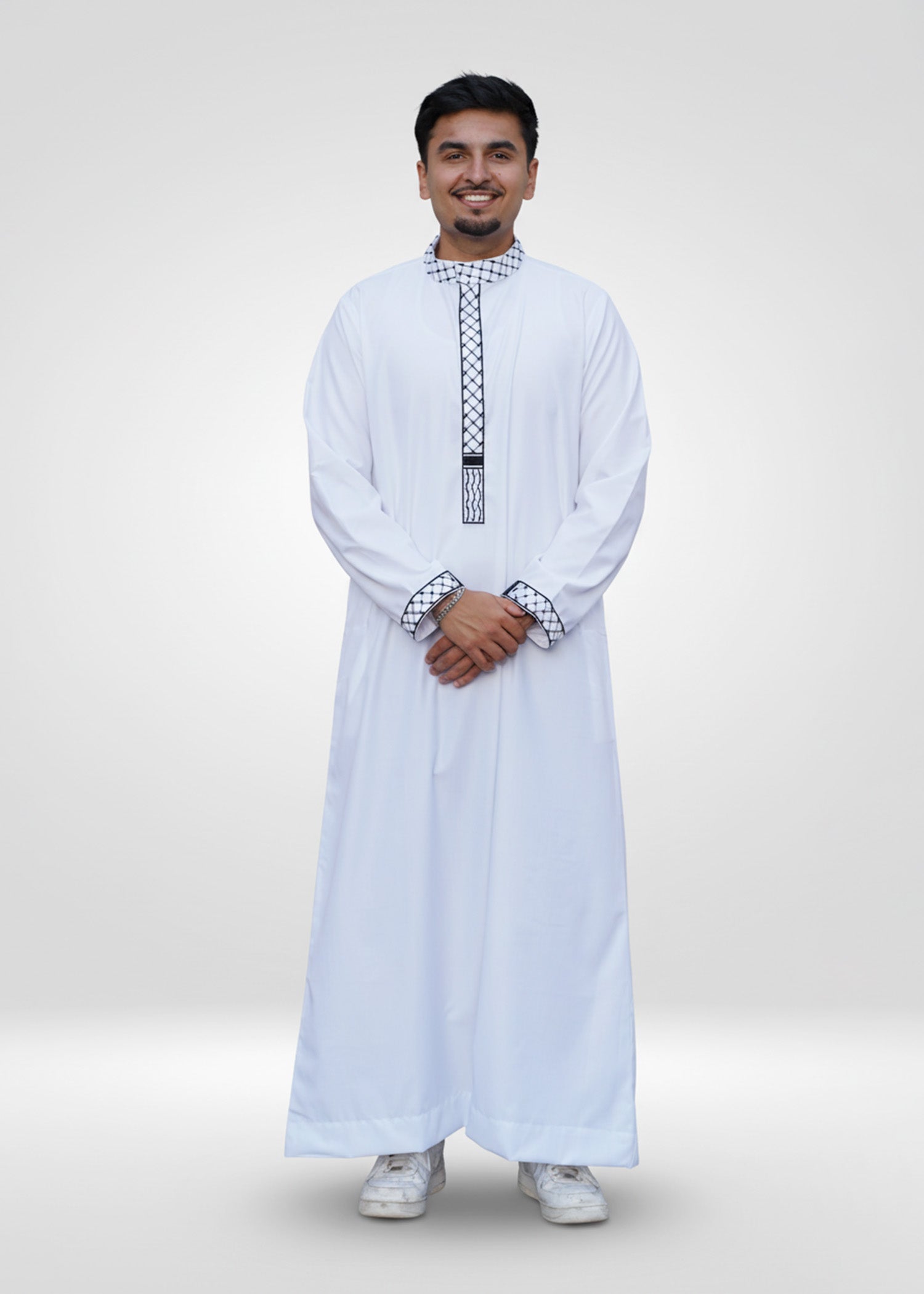 Front view of the Men's White Palestine Embroidered Thobe showing the crisp fabric and iconic kufiya details