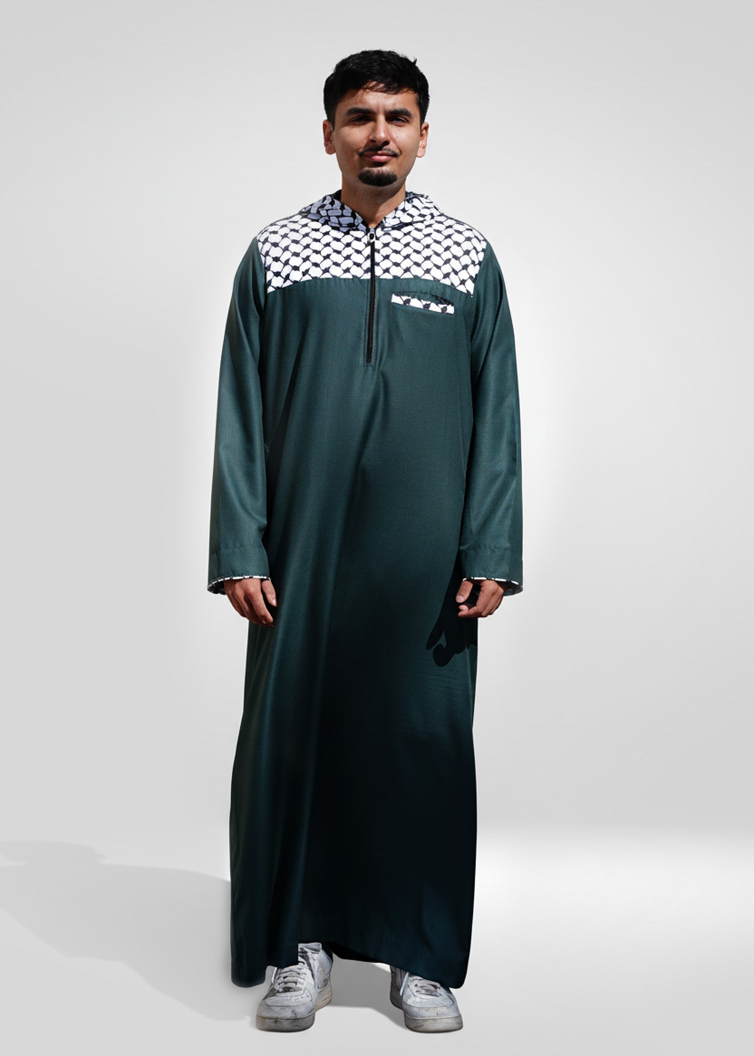 Front view of the Green Palestinian Hoodie Thobe showing the kufiya pattern and modern streetwear style