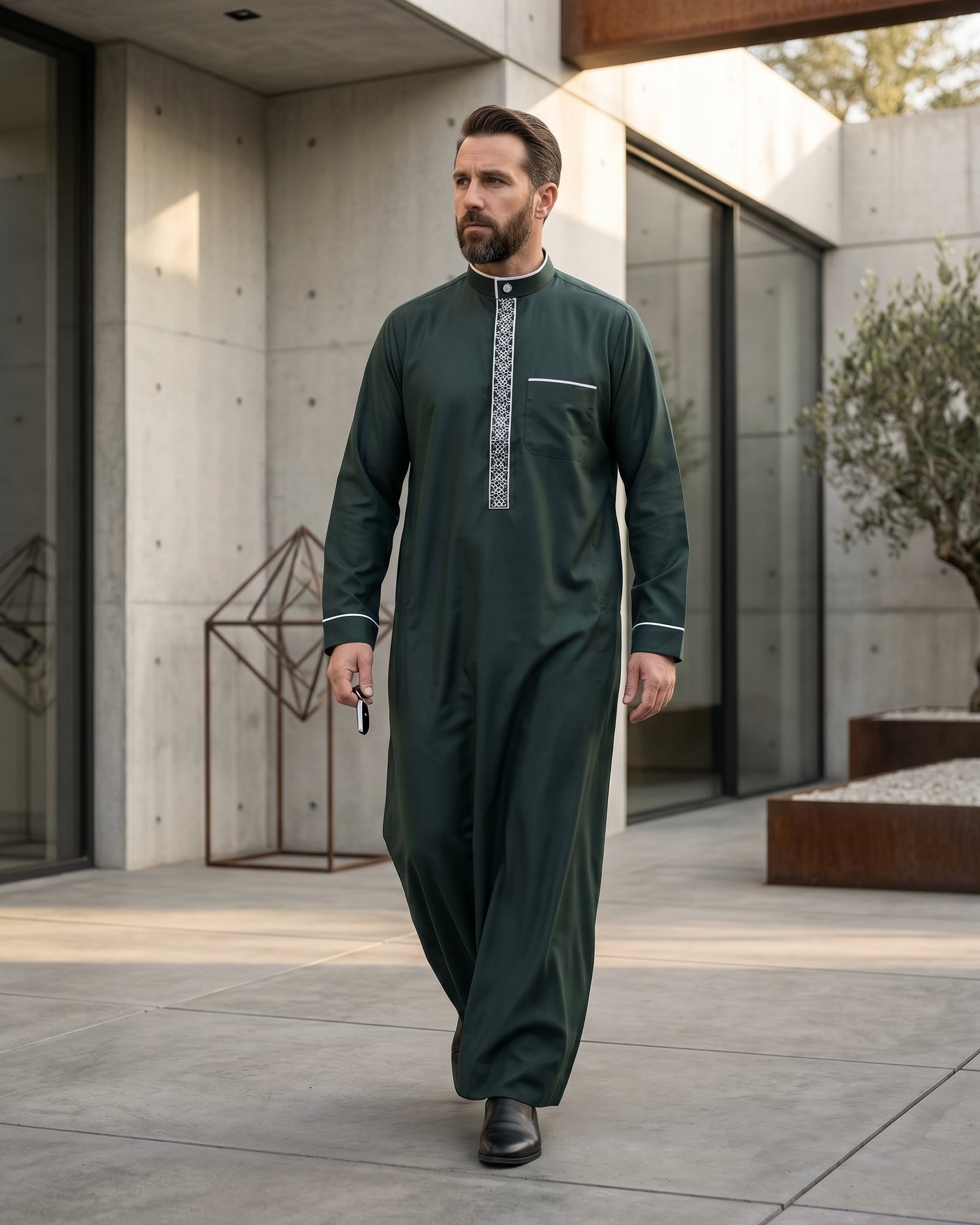Authentic Moroccan style men's gandora in deep green and white, luxury Islamic menswear, modest apparel for Muslims, formal Middle Eastern clothing, premium emerald executive thobe, best Eid clothing for men.