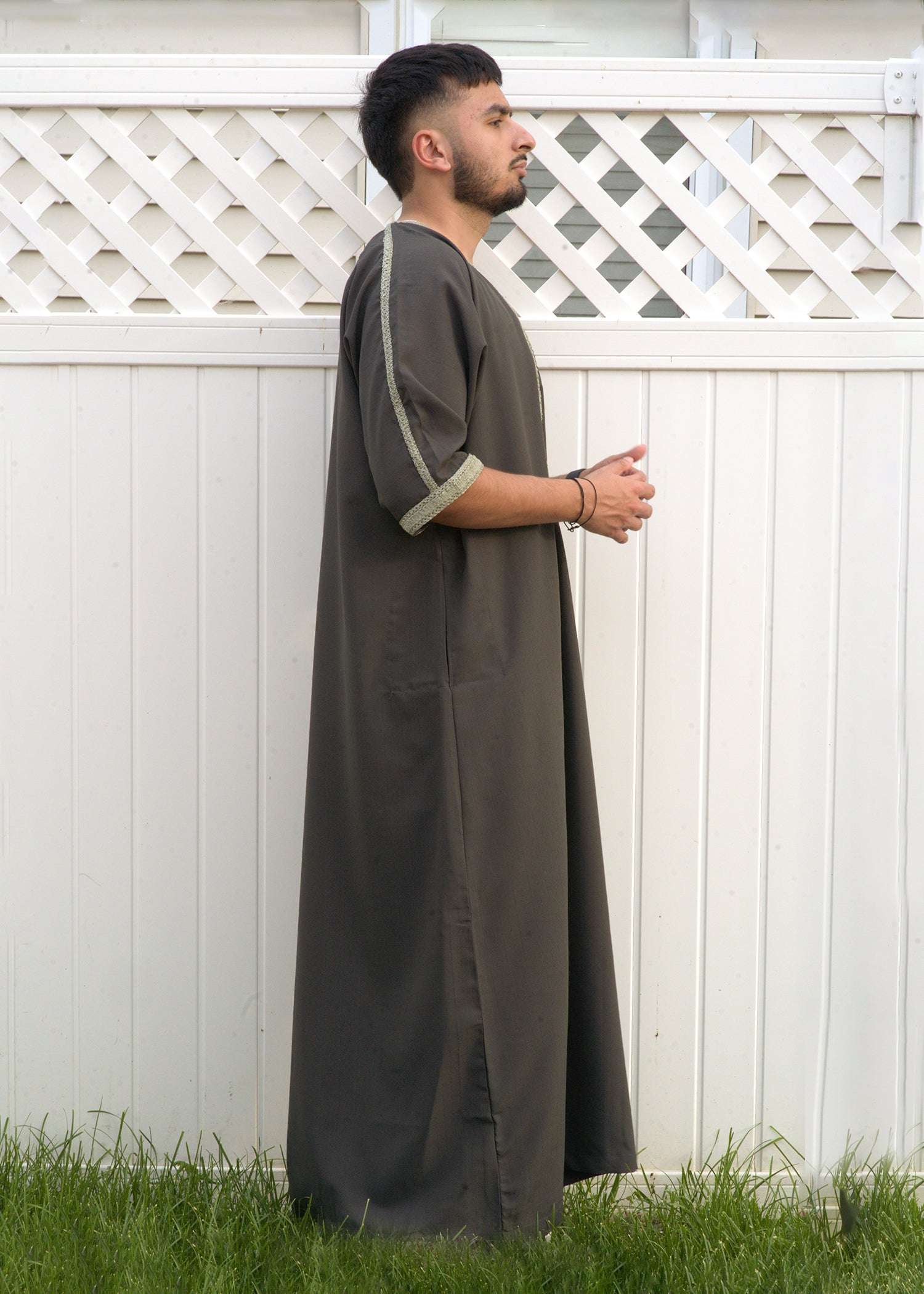Full body back view of the Mountain Olive Thobe, emphasizing the natural drape and quality of the fabric.