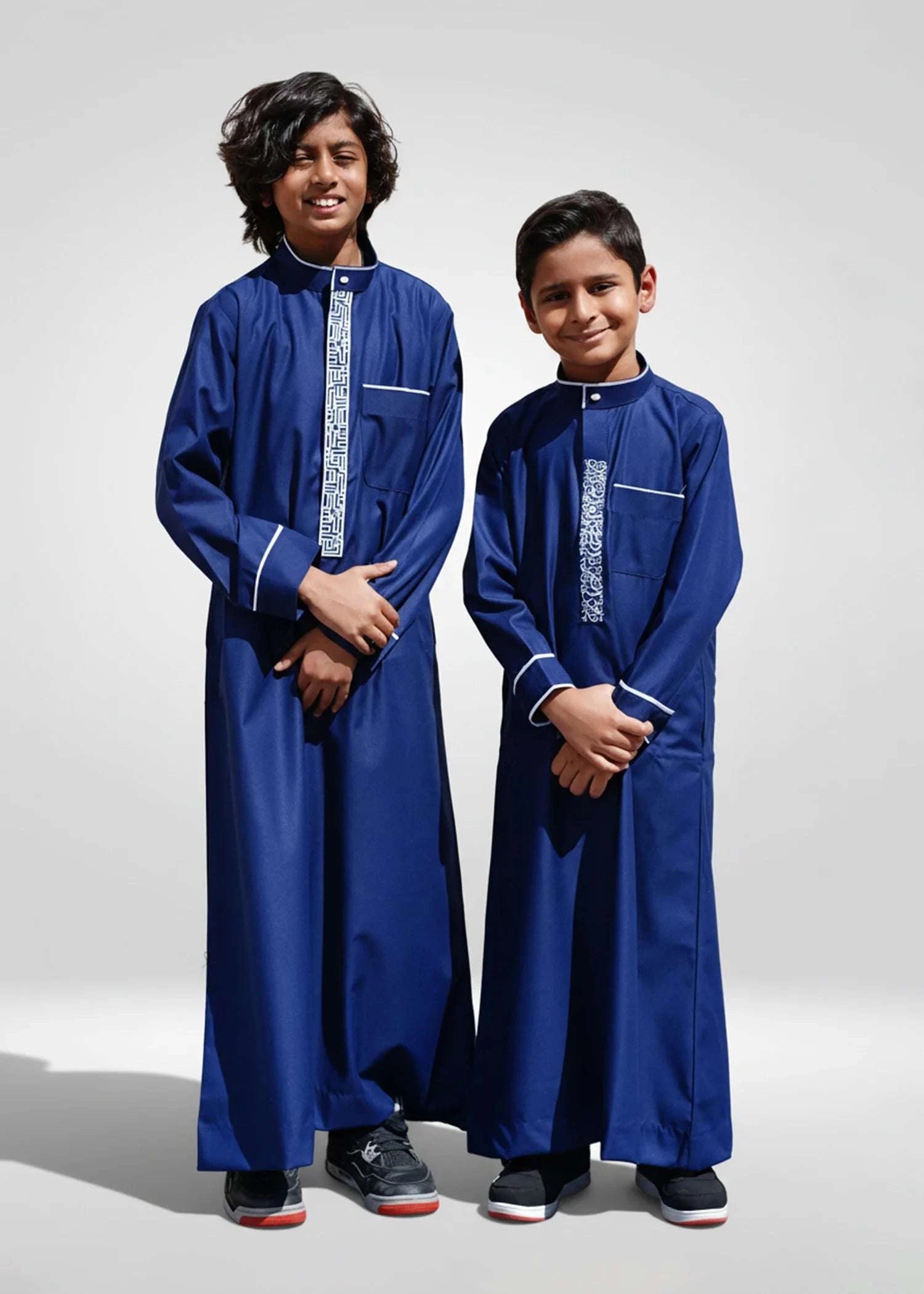 Navy blue embroidered thobe with silver geometric pattern for boys, back view