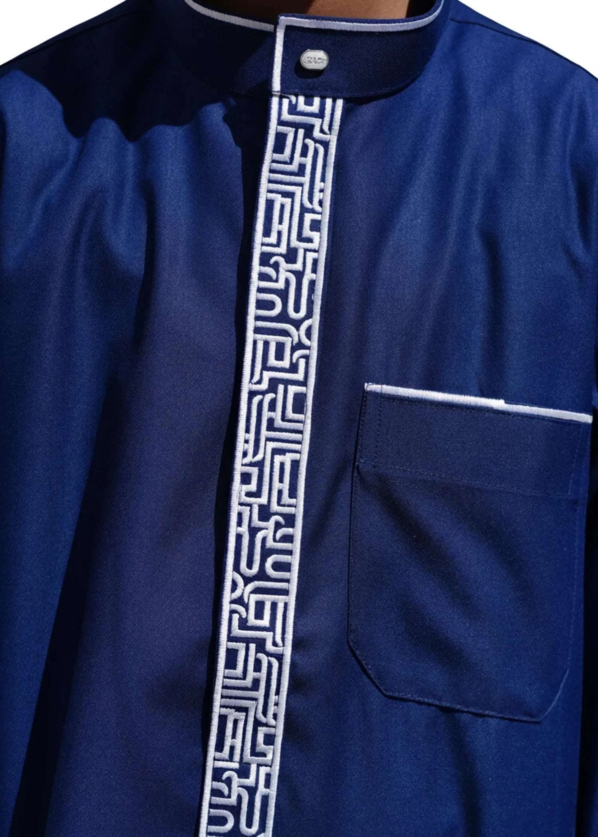 Navy blue embroidered thobe with silver geometric pattern for boys, embroidery in close detail