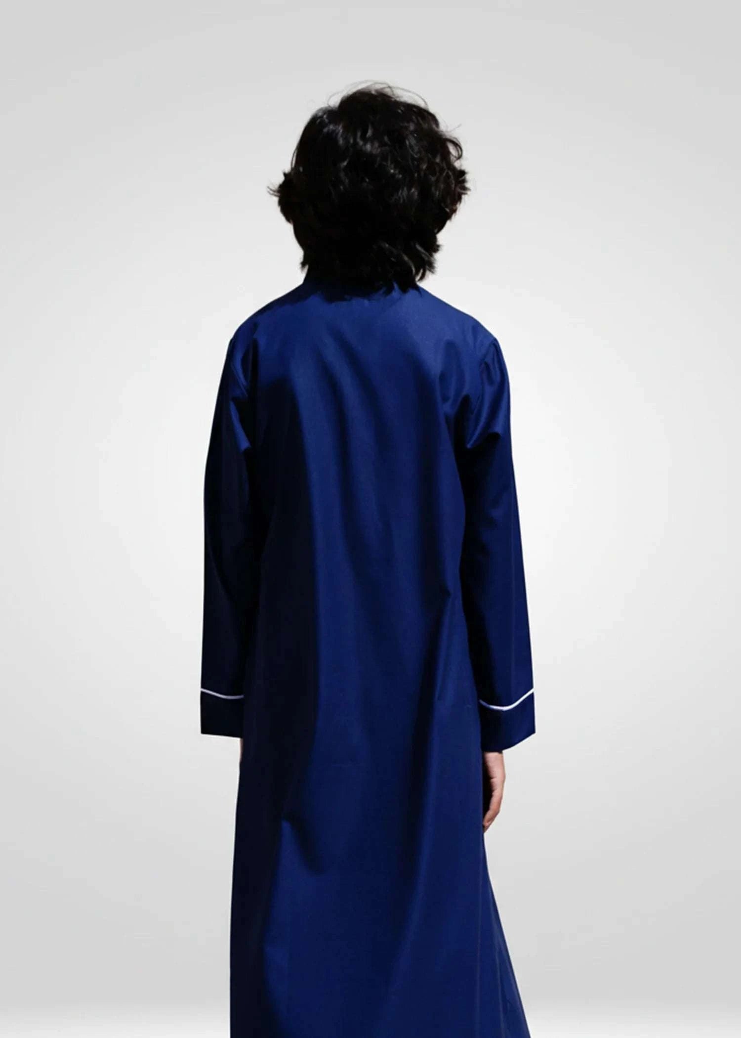 Navy blue embroidered thobe with silver geometric pattern for boys, length and sleeve line