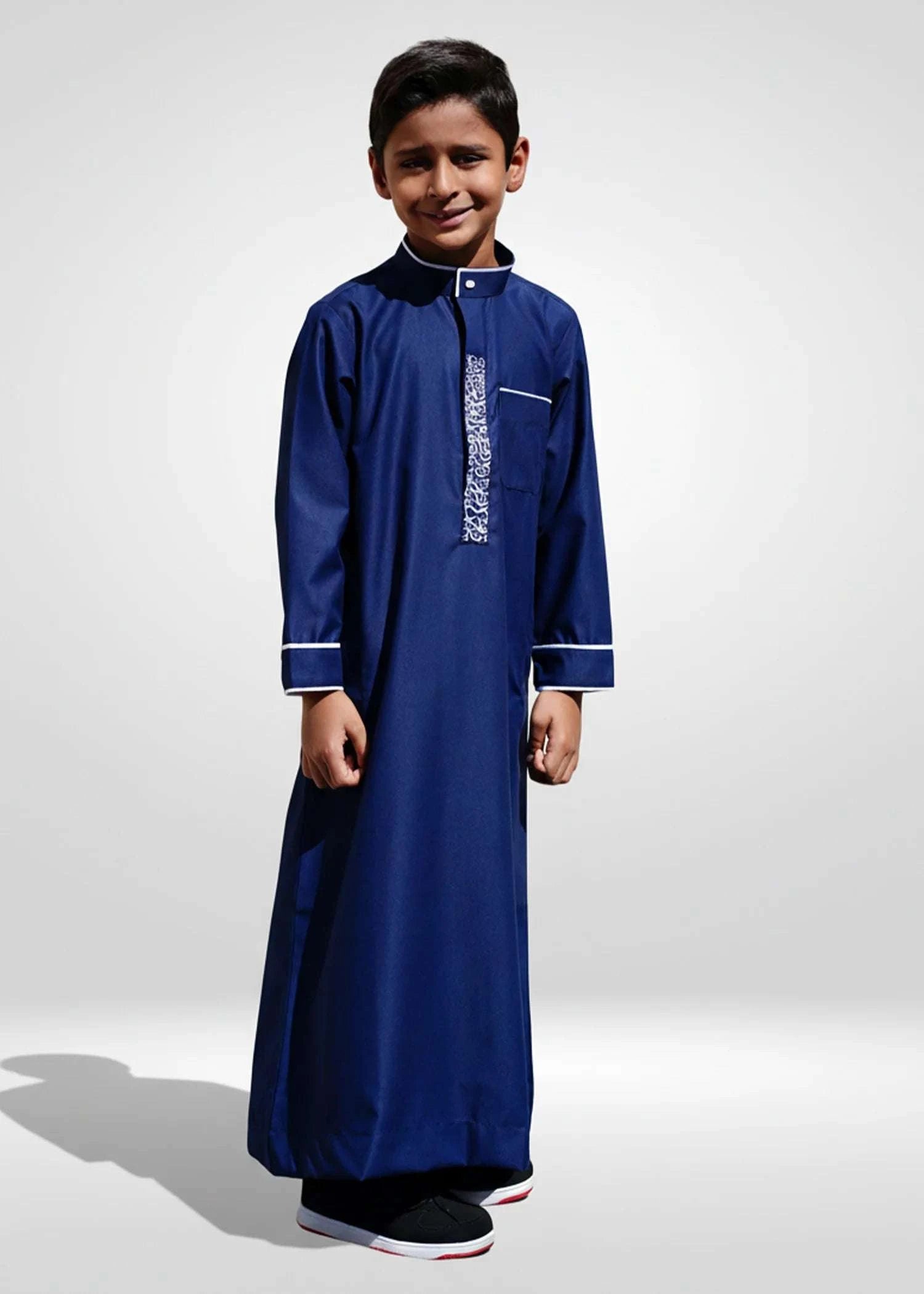 Navy blue embroidered thobe with white geometric detail for boys, embroidery in close detail