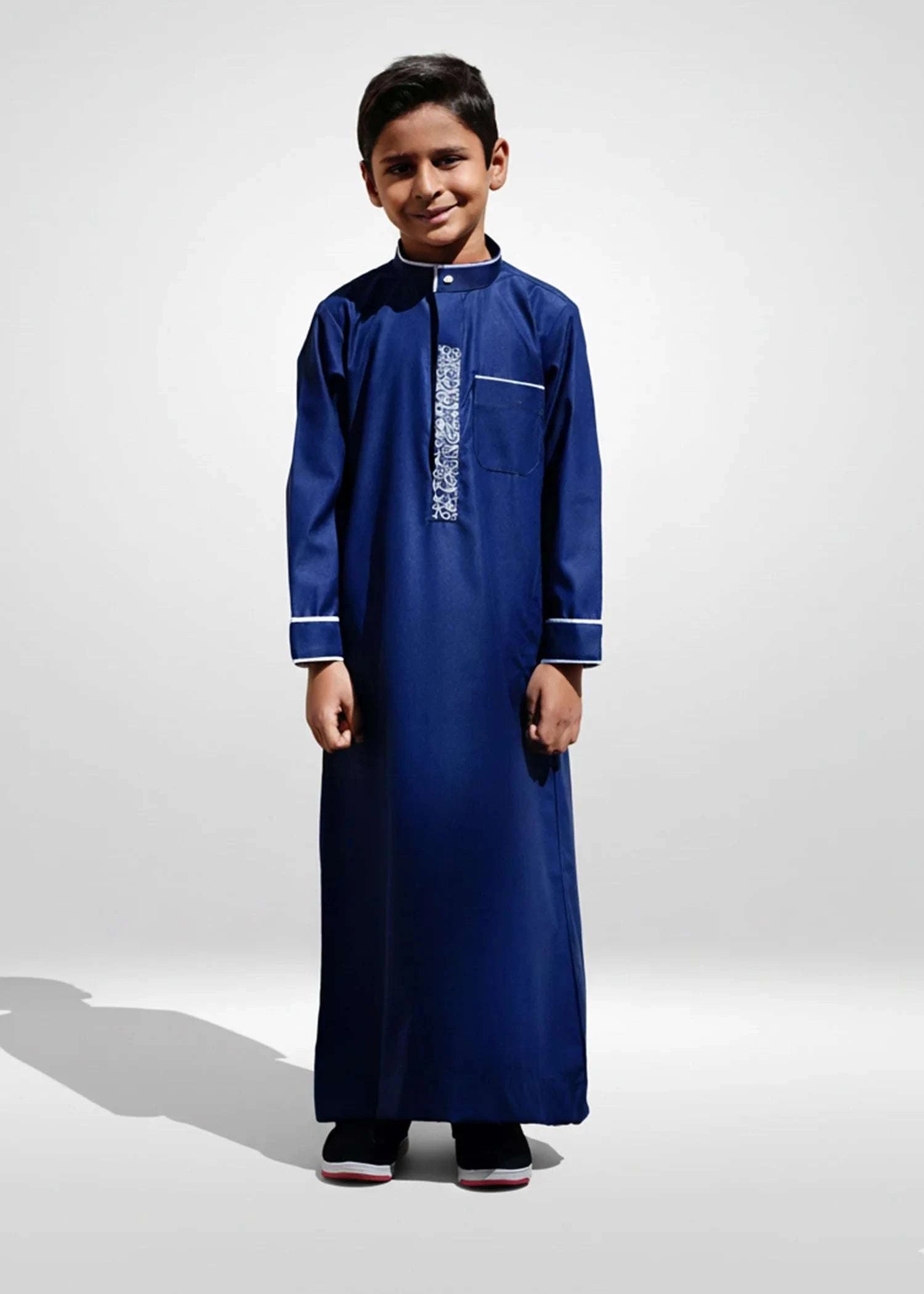 Navy blue embroidered thobe with white geometric detail for boys, full front view