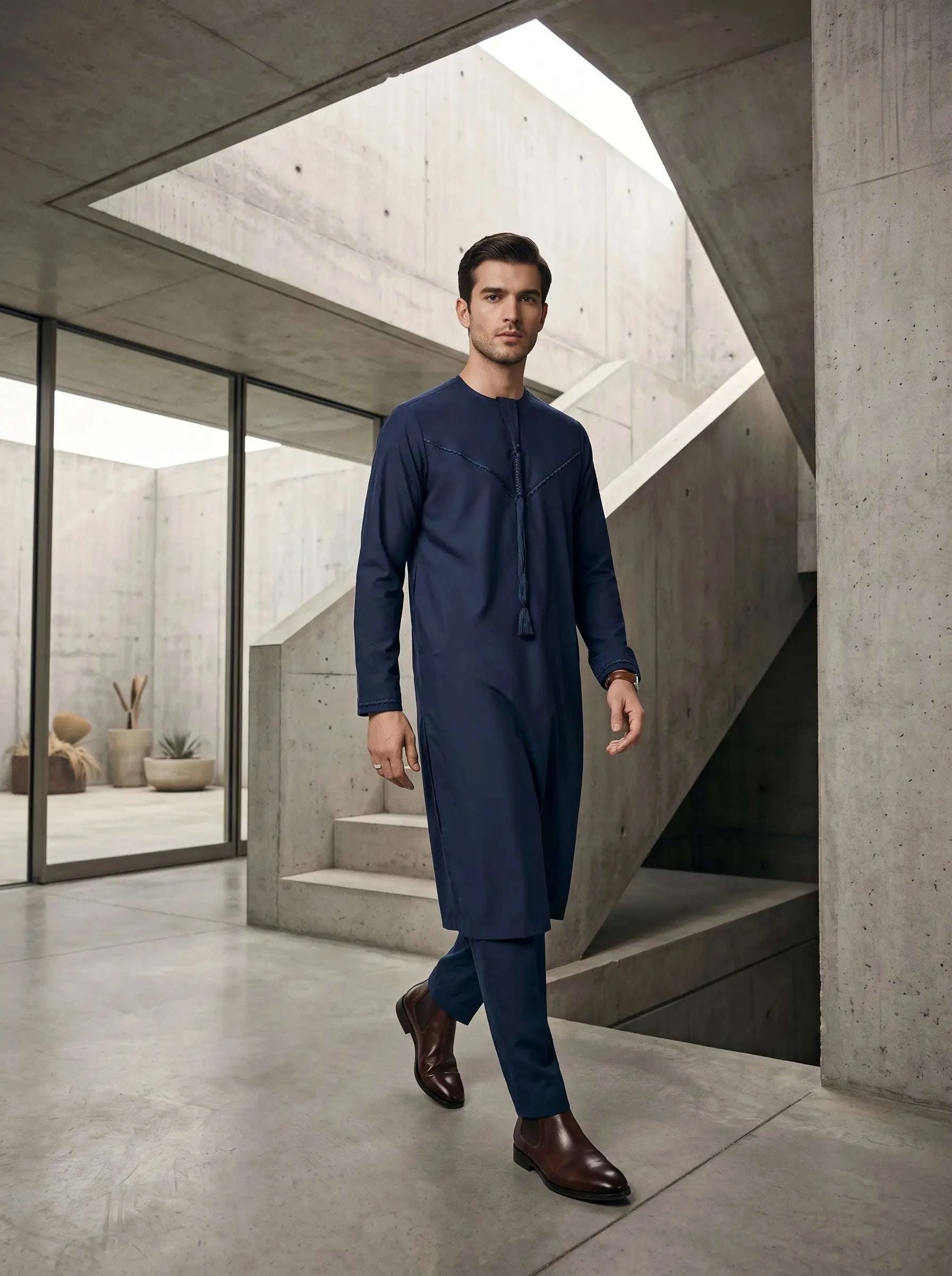 Navy blue Emirati thobe with braided tarboush for men, shown from the front