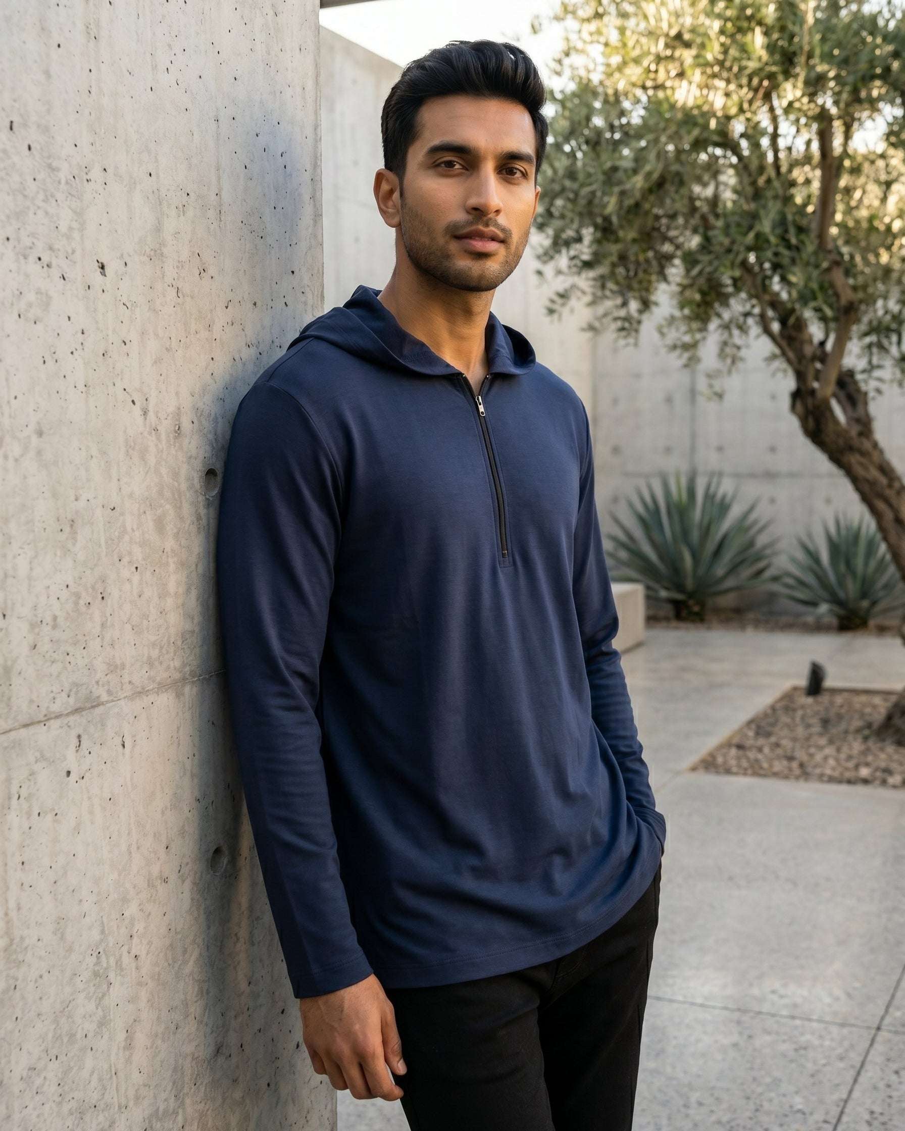 Navy blue hooded kurta with jersey half-zip for men, worn by a model outdoors