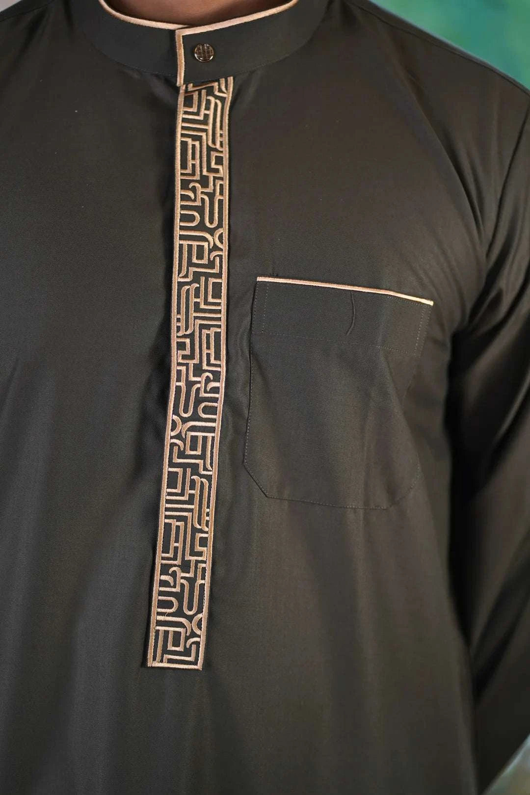 Olive green and gold embroidered thobe for men, stitched pattern in close detail