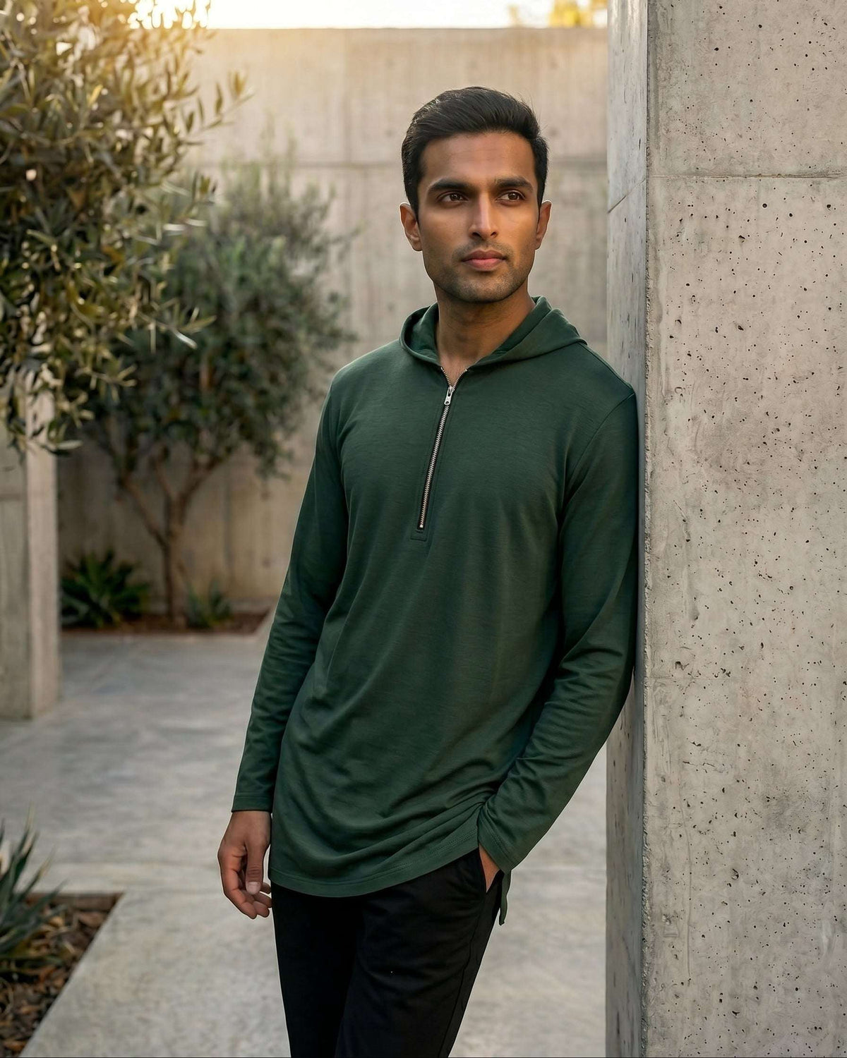 Olive green hooded kurta with half-zip jersey for men, close-up of the zip pull