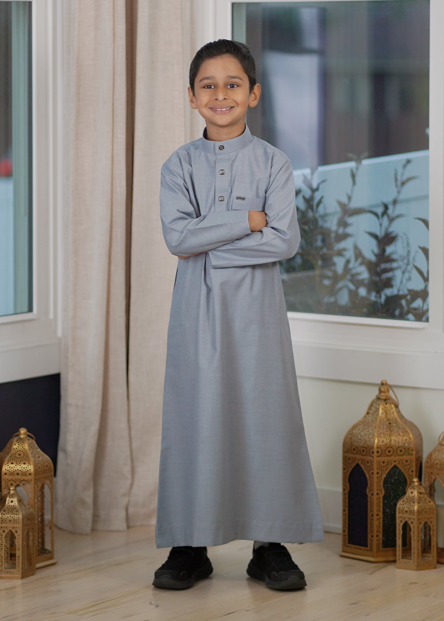 Front view of the Plain Light Gray Kids Thobe showing the versatile neutral color and comfortable fit
