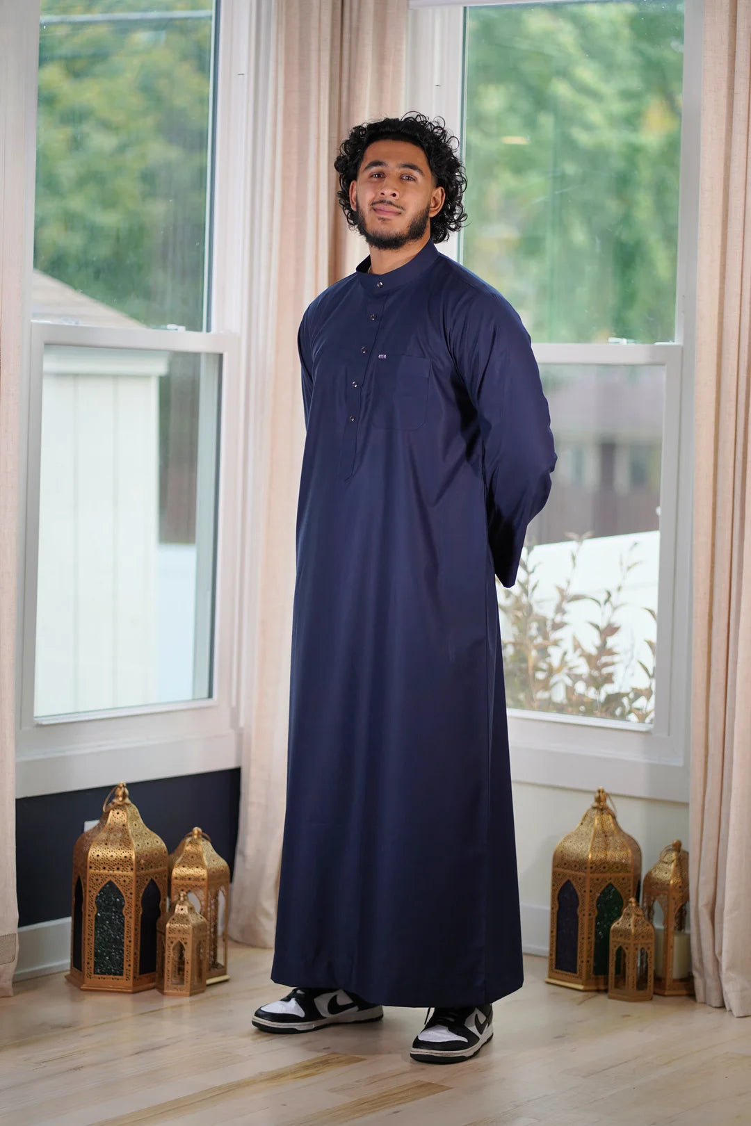 Front view of the Plain Navy Blue Thobe showing the deep color and classic mandarin collar