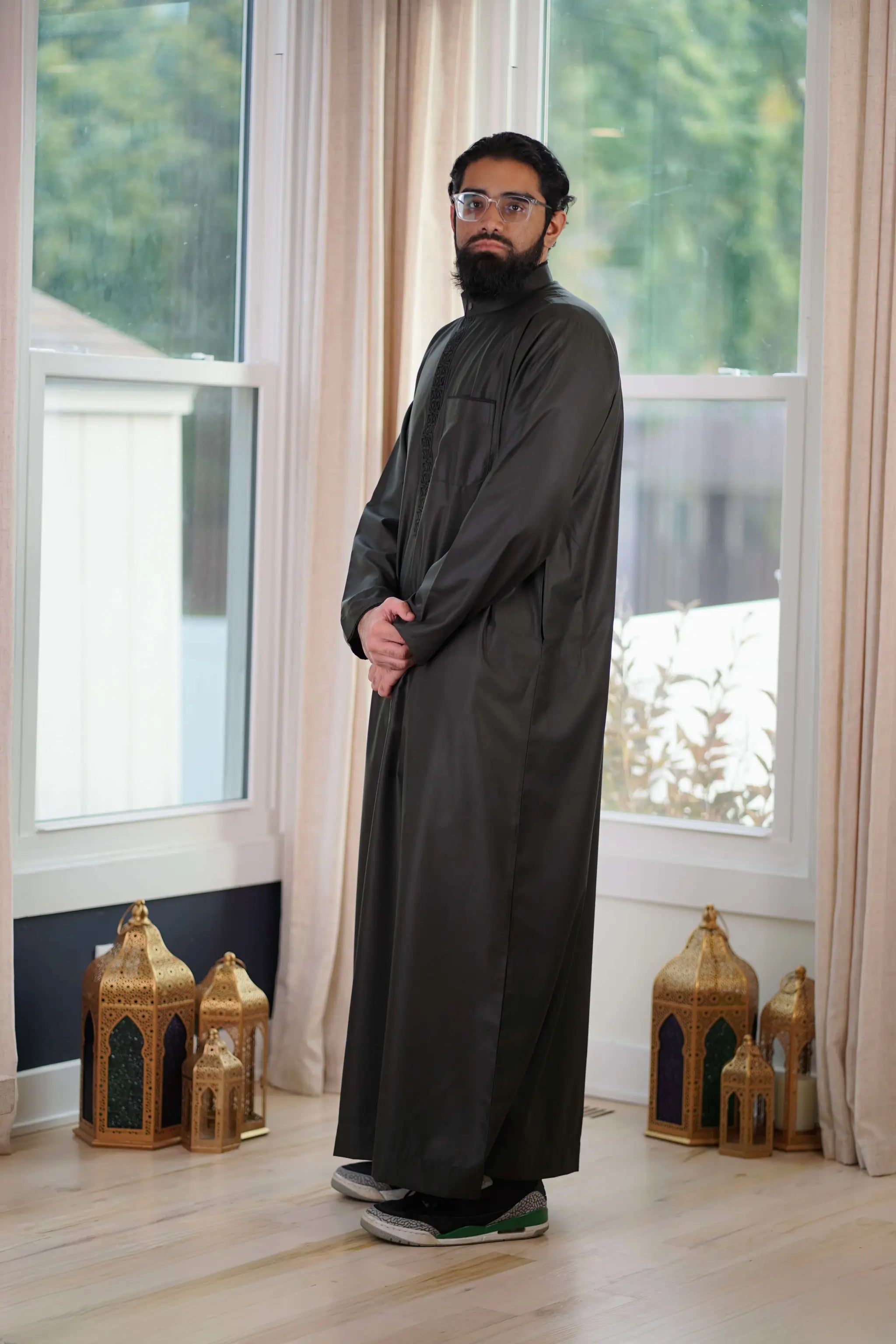 Model wearing the thobe in a lifestyle setting, emphasizing premium Muslim Thobe for Formal wear and US-wide delivery.