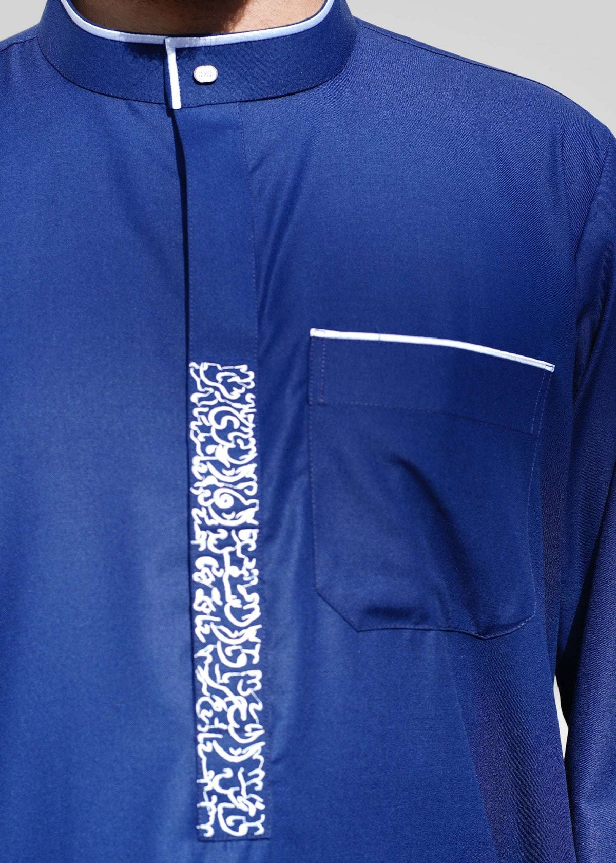 Royal blue and white embroidered thobe with mandarin collar for men, side profile view