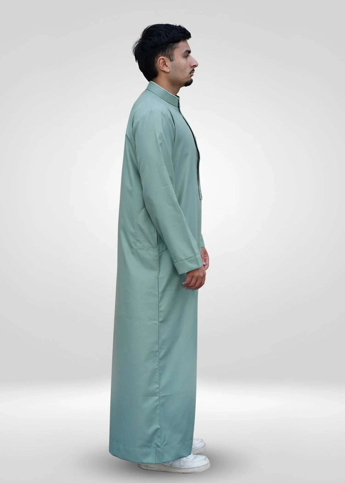 Sage green embroidered thobe with mandarin collar for men, embroidery shown in close detail